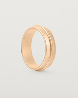 Standing view of the Seam Wedding Ring | 6mm | Rose Gold.