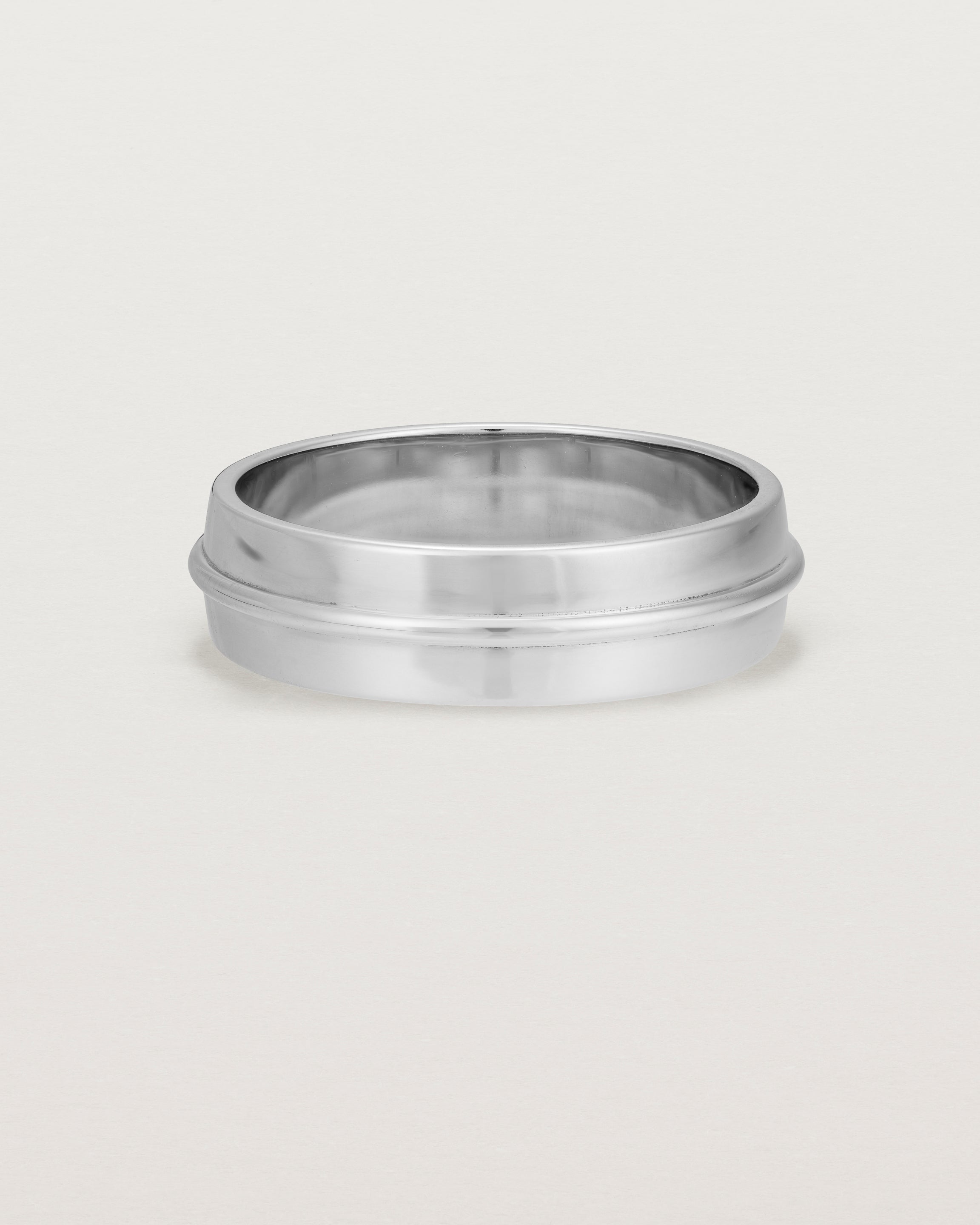Front view of the Seam Wedding Ring | 6mm | White  Gold.
