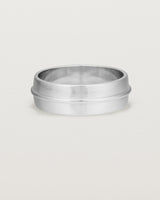 Front view of the Seam Wedding Ring | 7mm | White Gold.