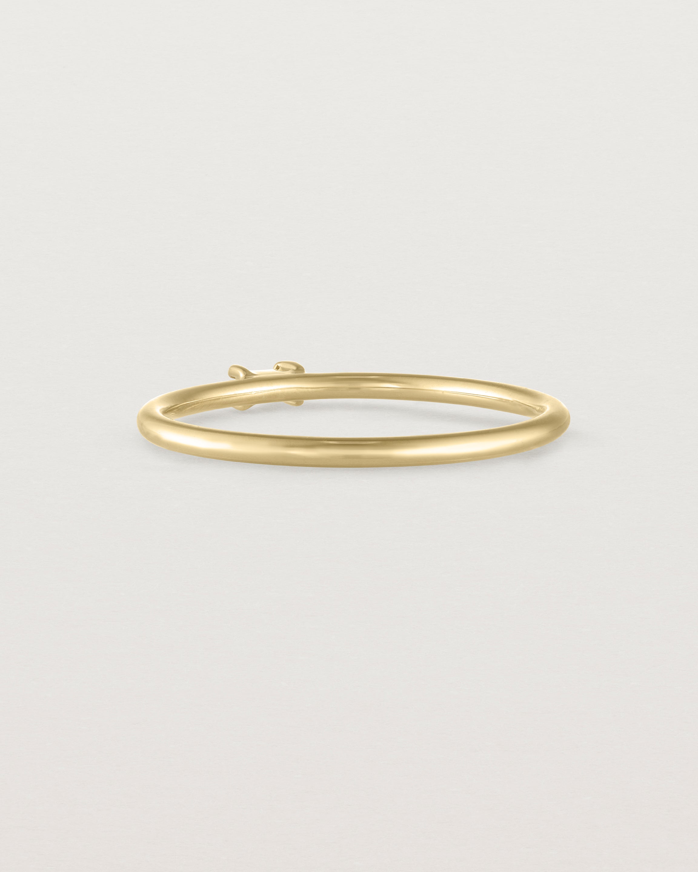 Back view of the Sena Stacking Ring | Diamond in yellow gold.