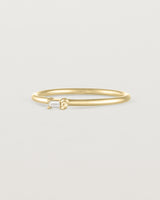 Angled view of the Sena Stacking Ring | Diamond in yellow gold.