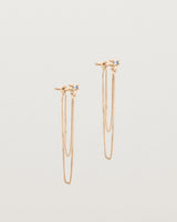 A pair of Sena Loop Studs | Sapphire & Diamond | Rose Gold.