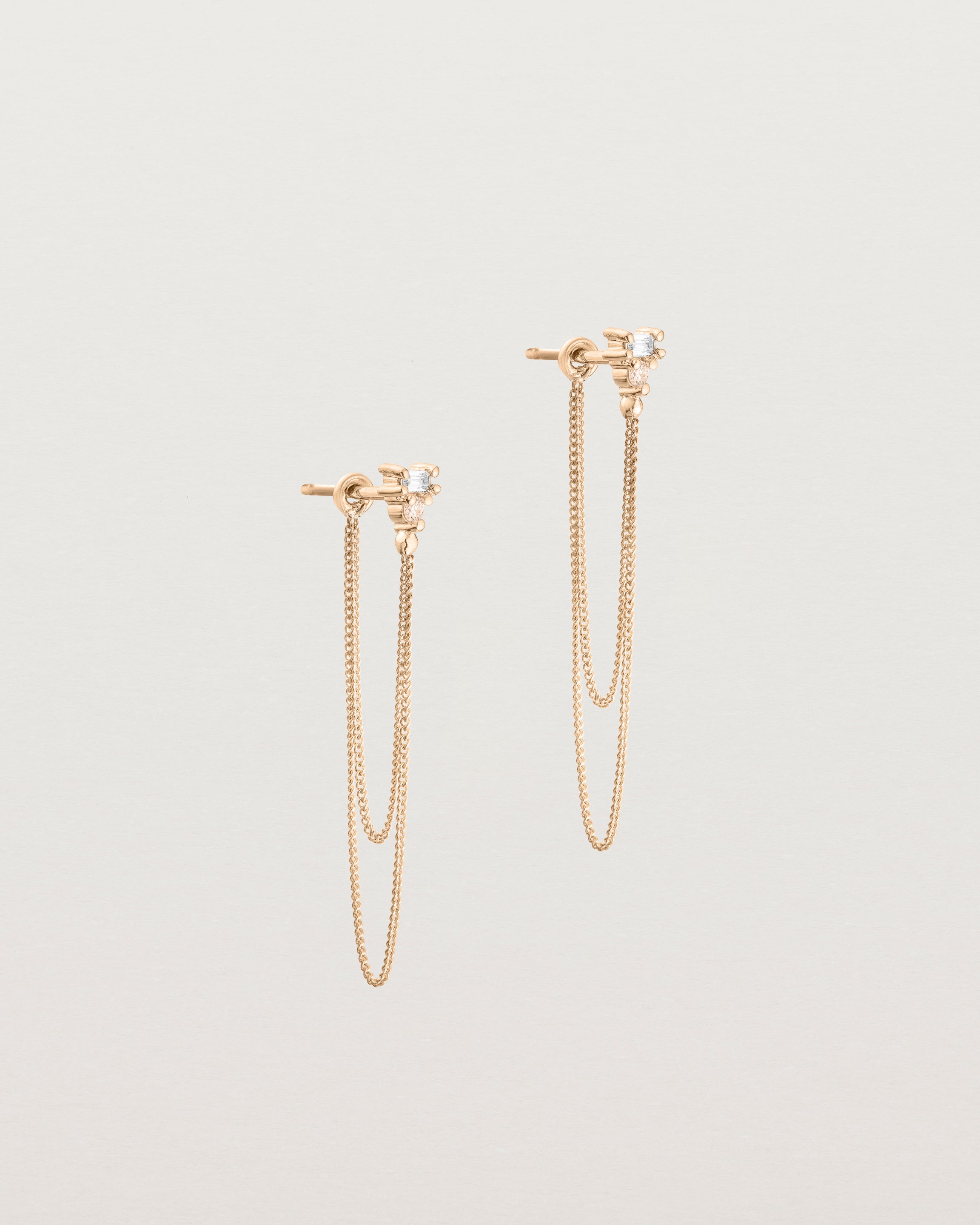 A pair of Sena Loop Studs | Diamonds | Rose Gold