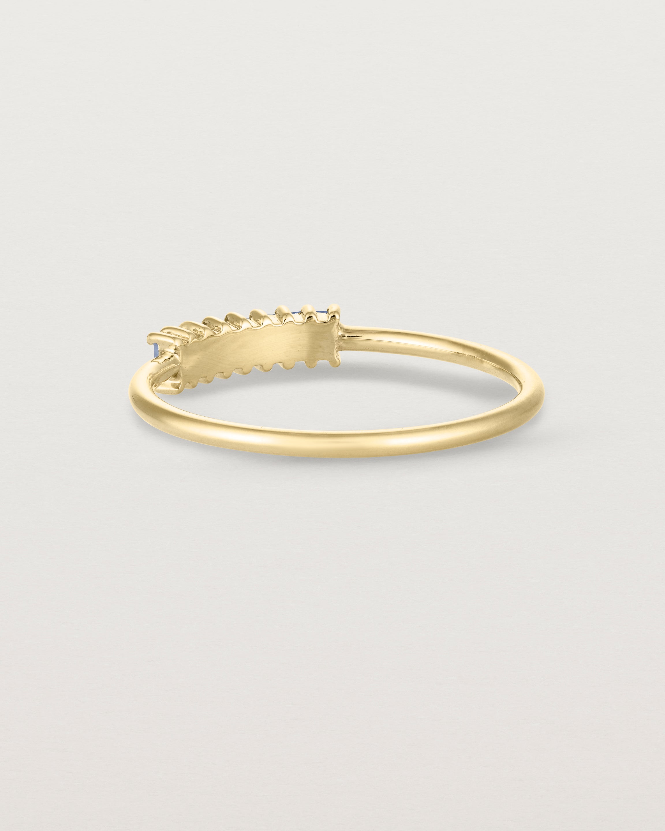 Back view of the Sena Wrap Ring | Sapphire in yellow gold.