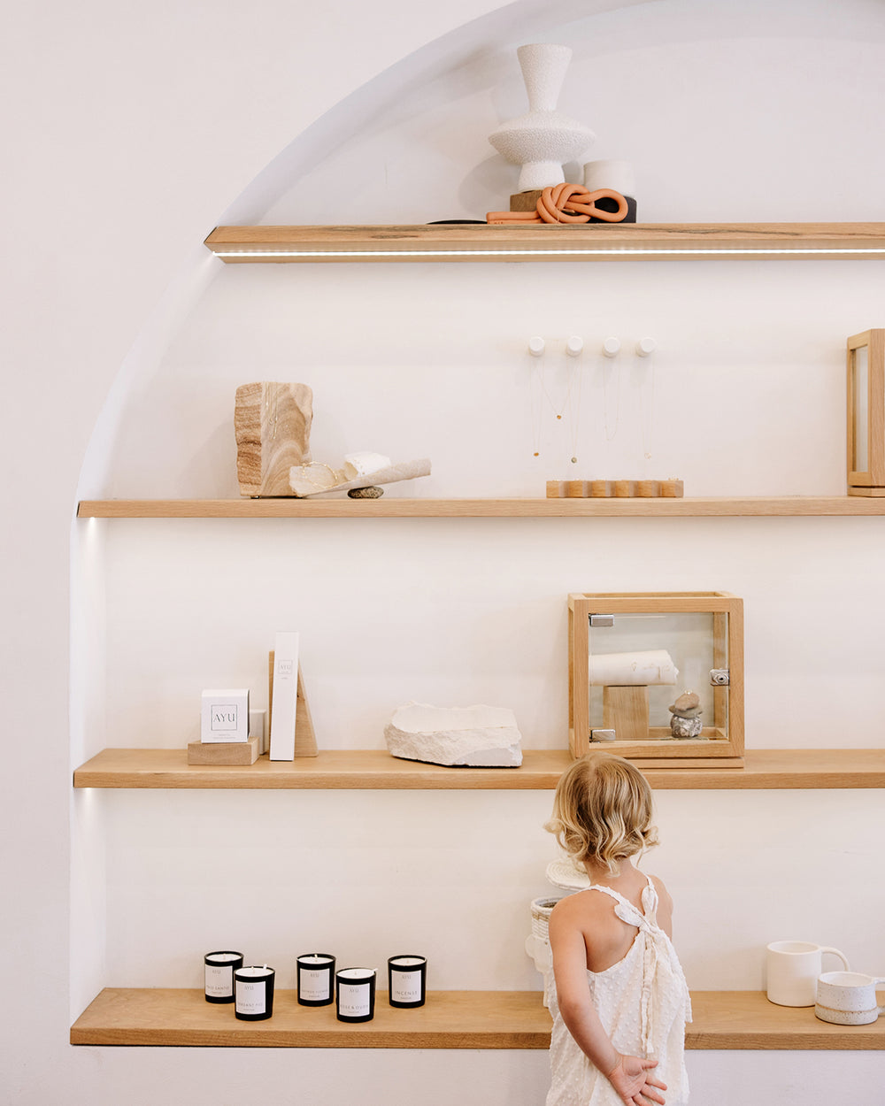 A child exploring the Natalie Marie Jewellery showroom.