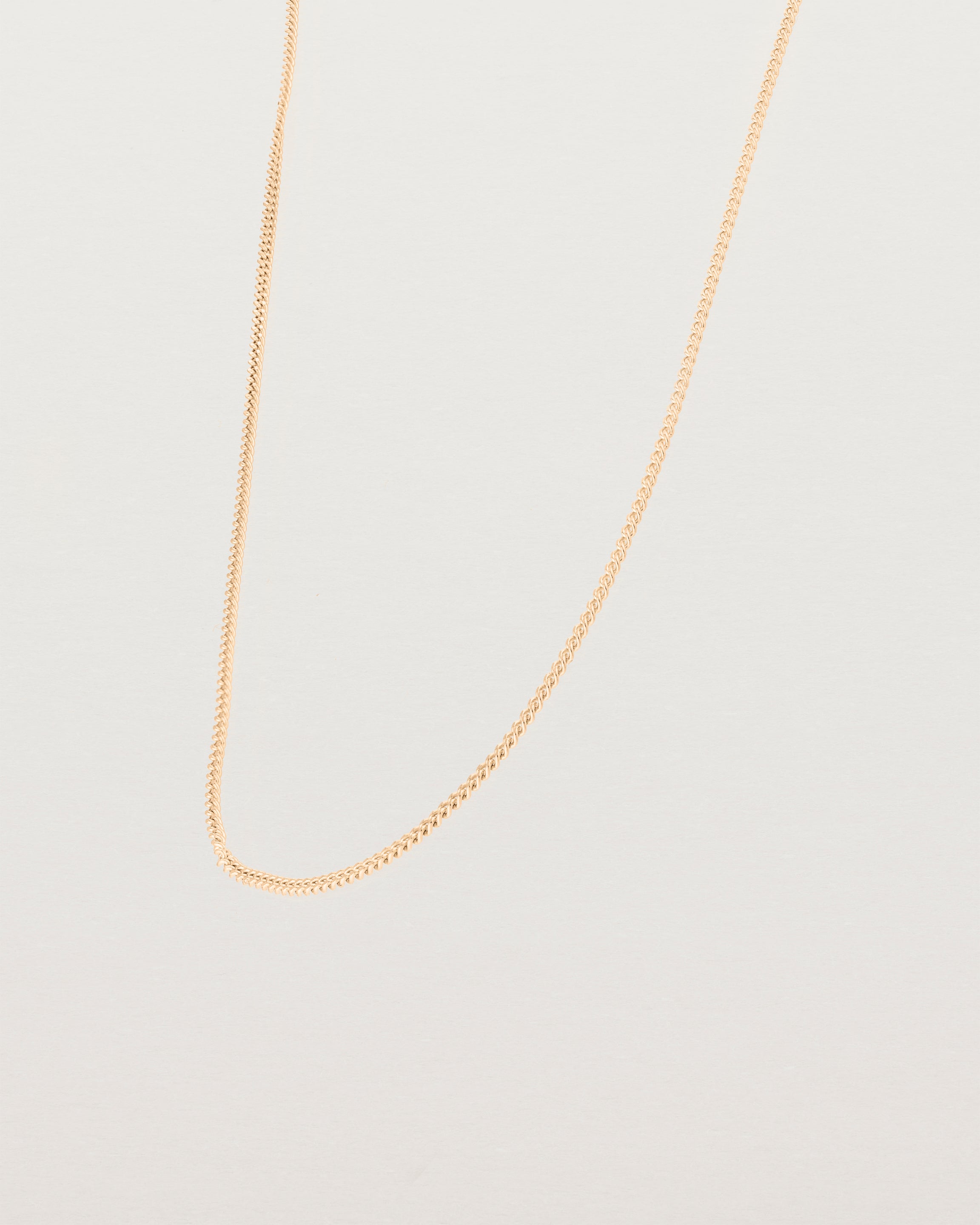 Angled view of the Simple Chain Necklace | Rose Gold