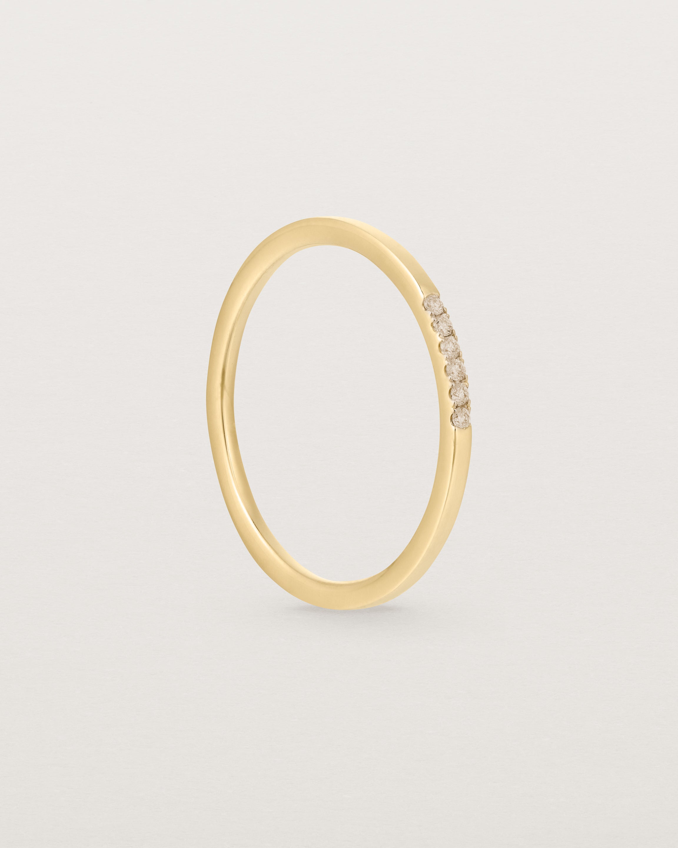 Standing view of the Six Stone Queenie Ring | Champagne Diamonds | Yellow Gold.