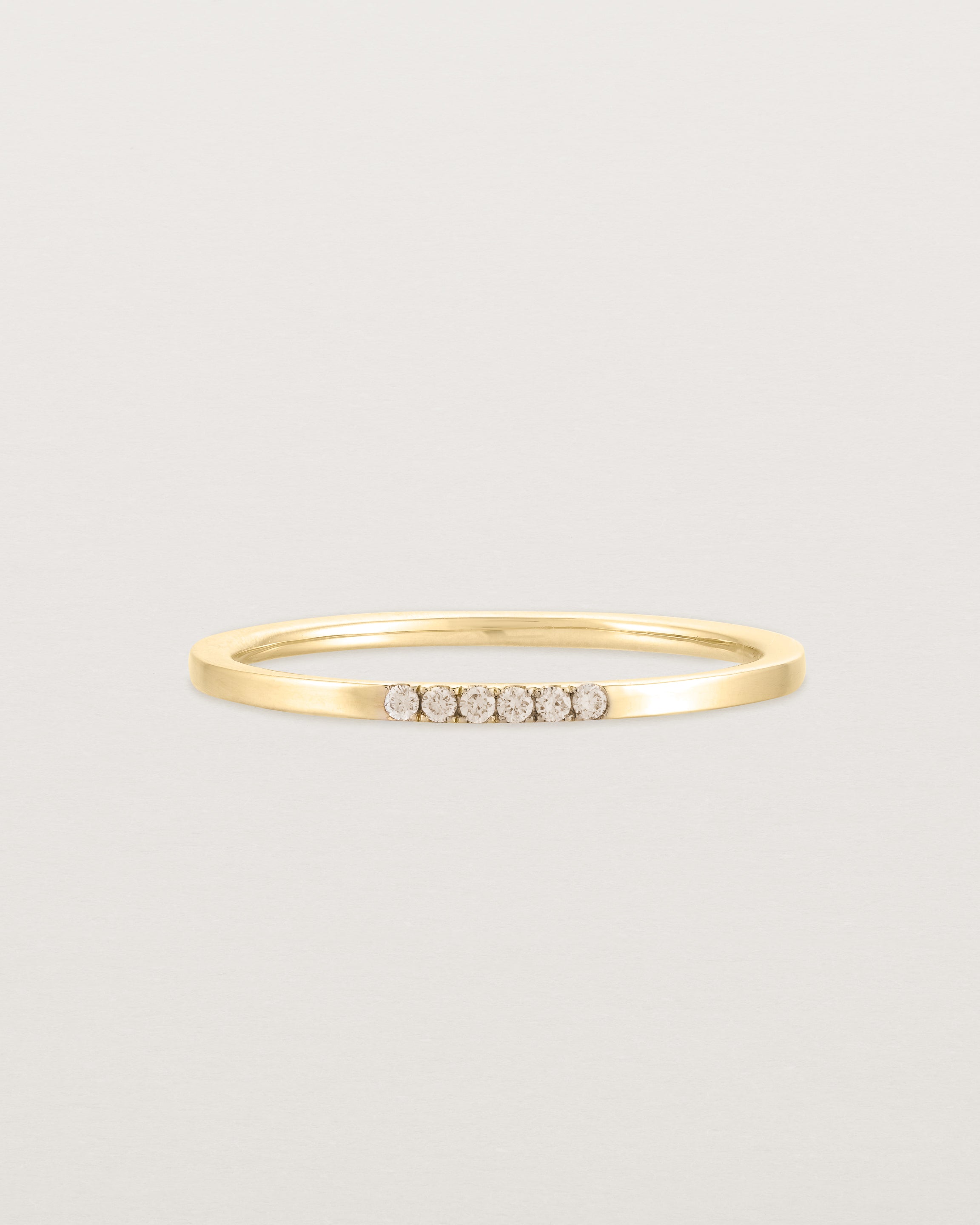 Front view of the Six Stone Queenie Ring | Champagne Diamonds | Yellow Gold.