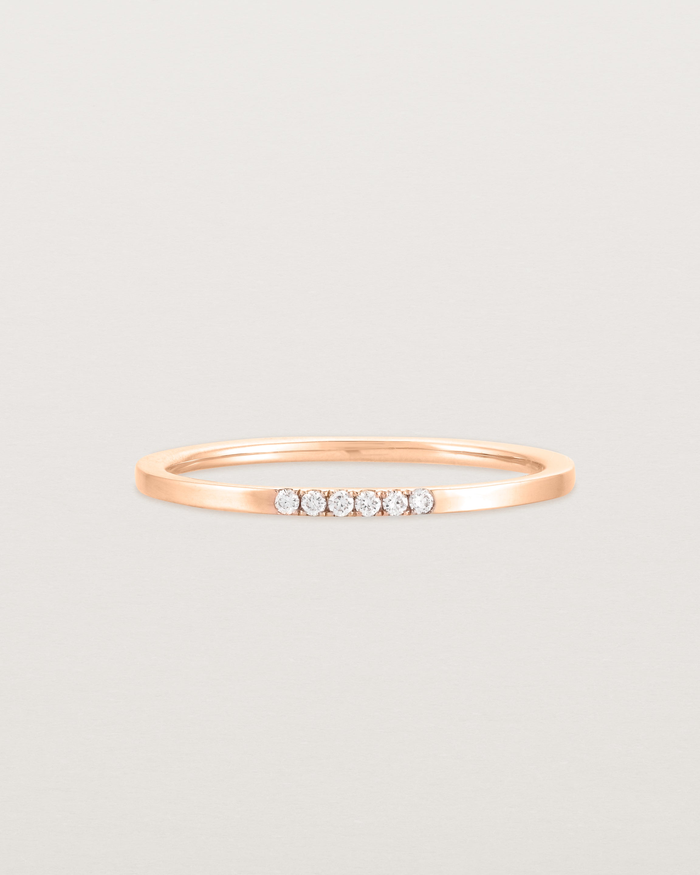 Front view of the Six Stone Queenie Ring | Diamonds in Rose Gold.