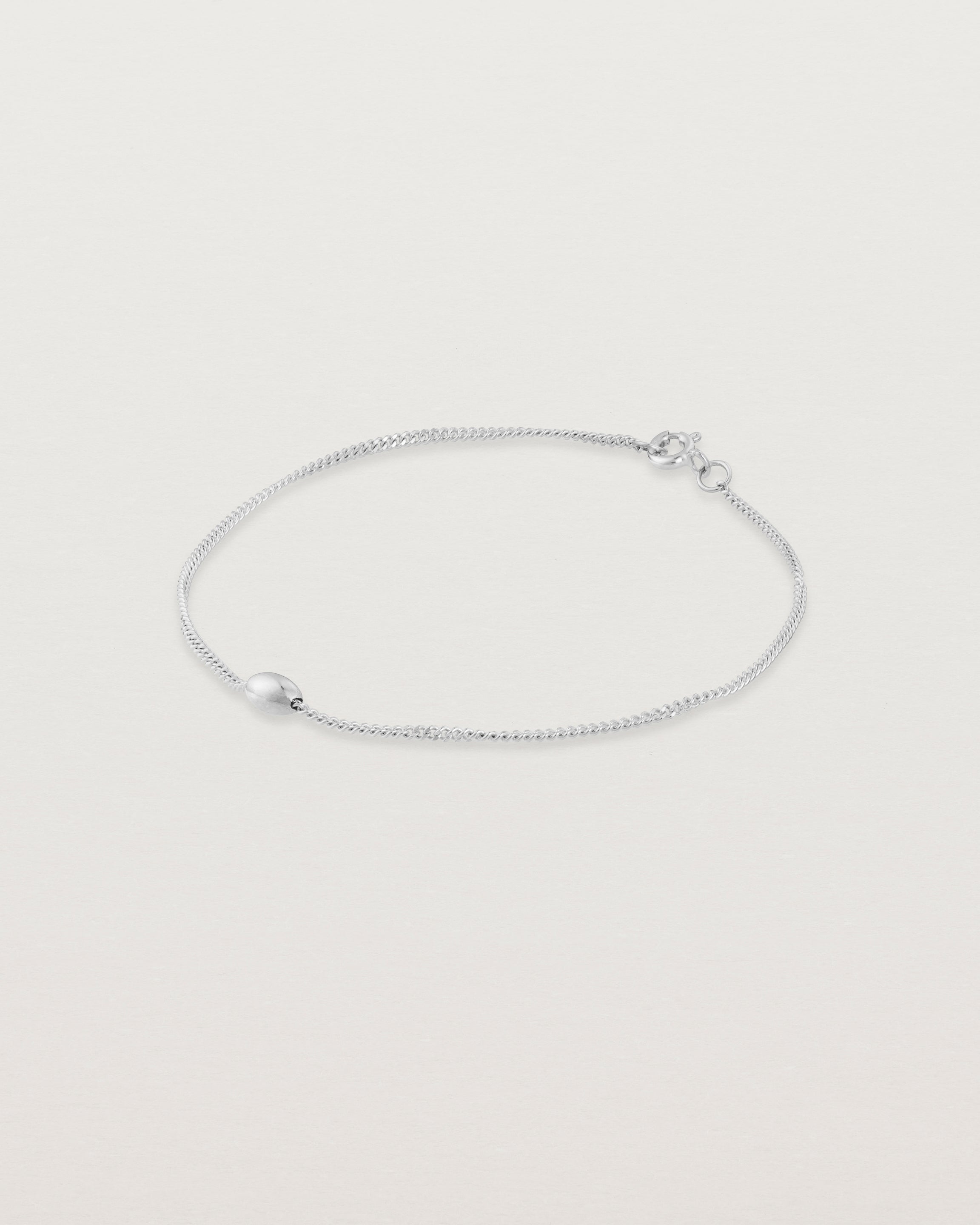 Sonder bracelet in sterling showing one charm