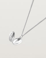 Open view of the Spotted Orchid Locket in sterling silver.