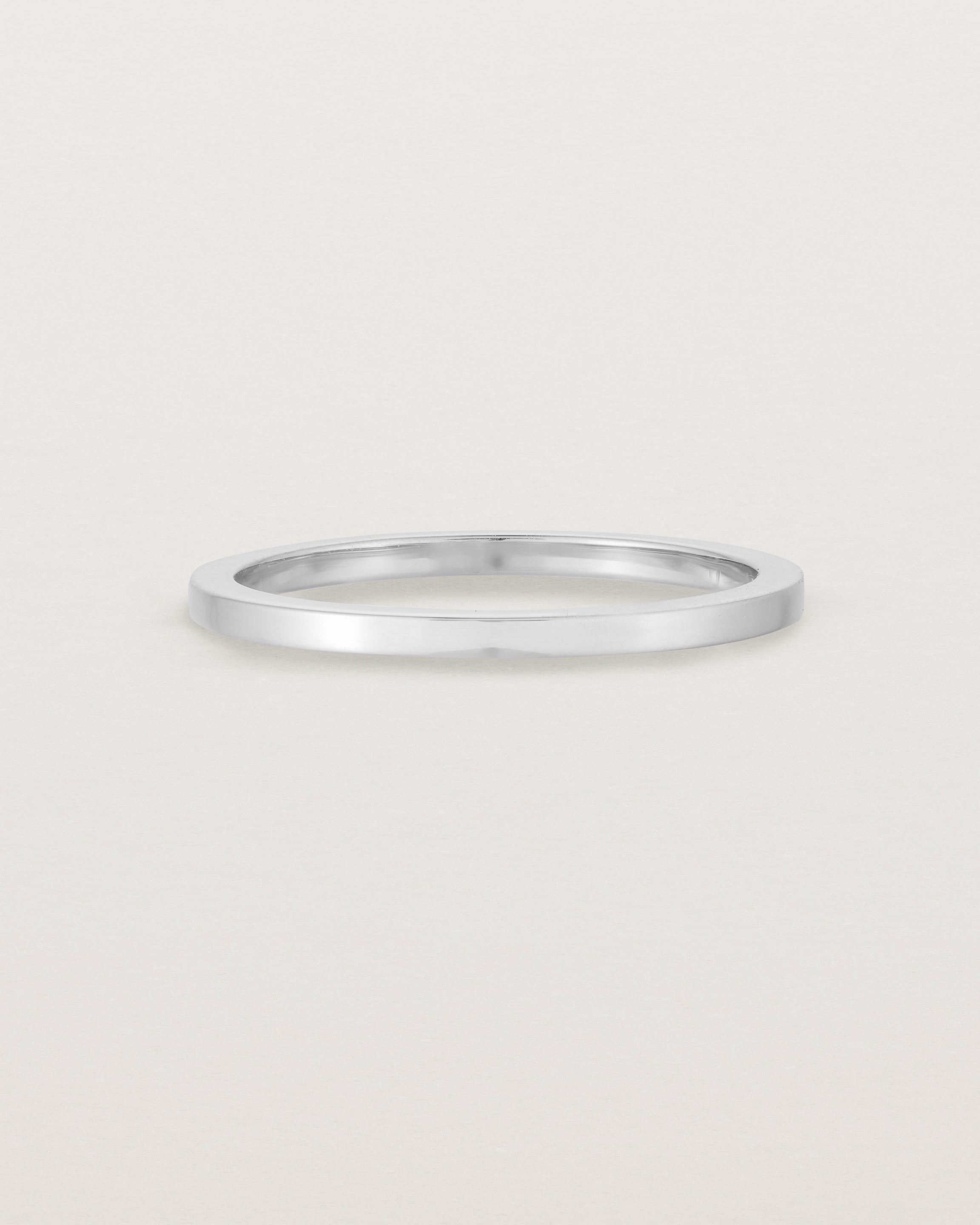 Our 1.5mm square wedding band in white gold