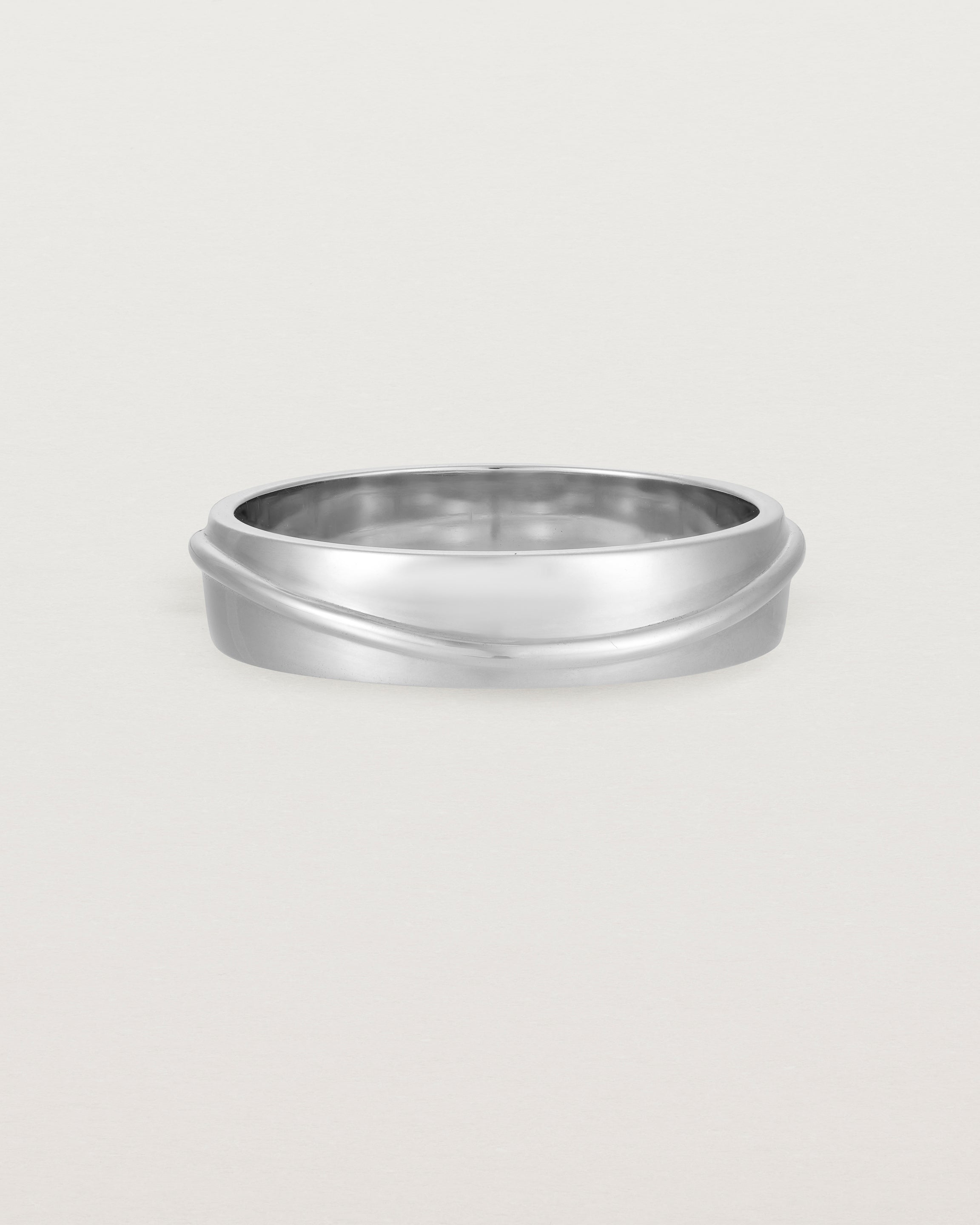 Side view of the Surge Wedding Ring | 5mm | White Gold.