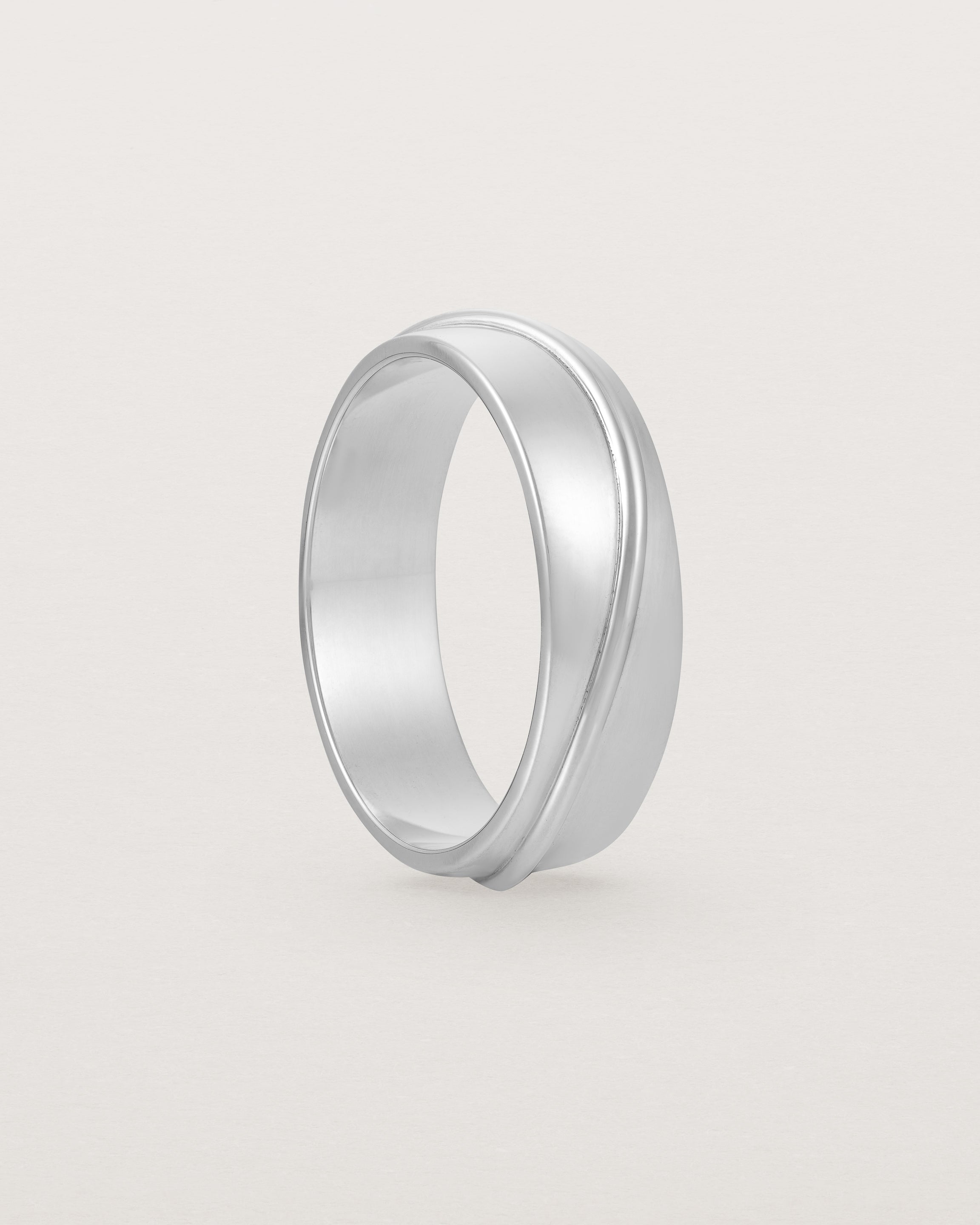 Standing view of the Surge Wedding Ring | 6mm | White Gold.