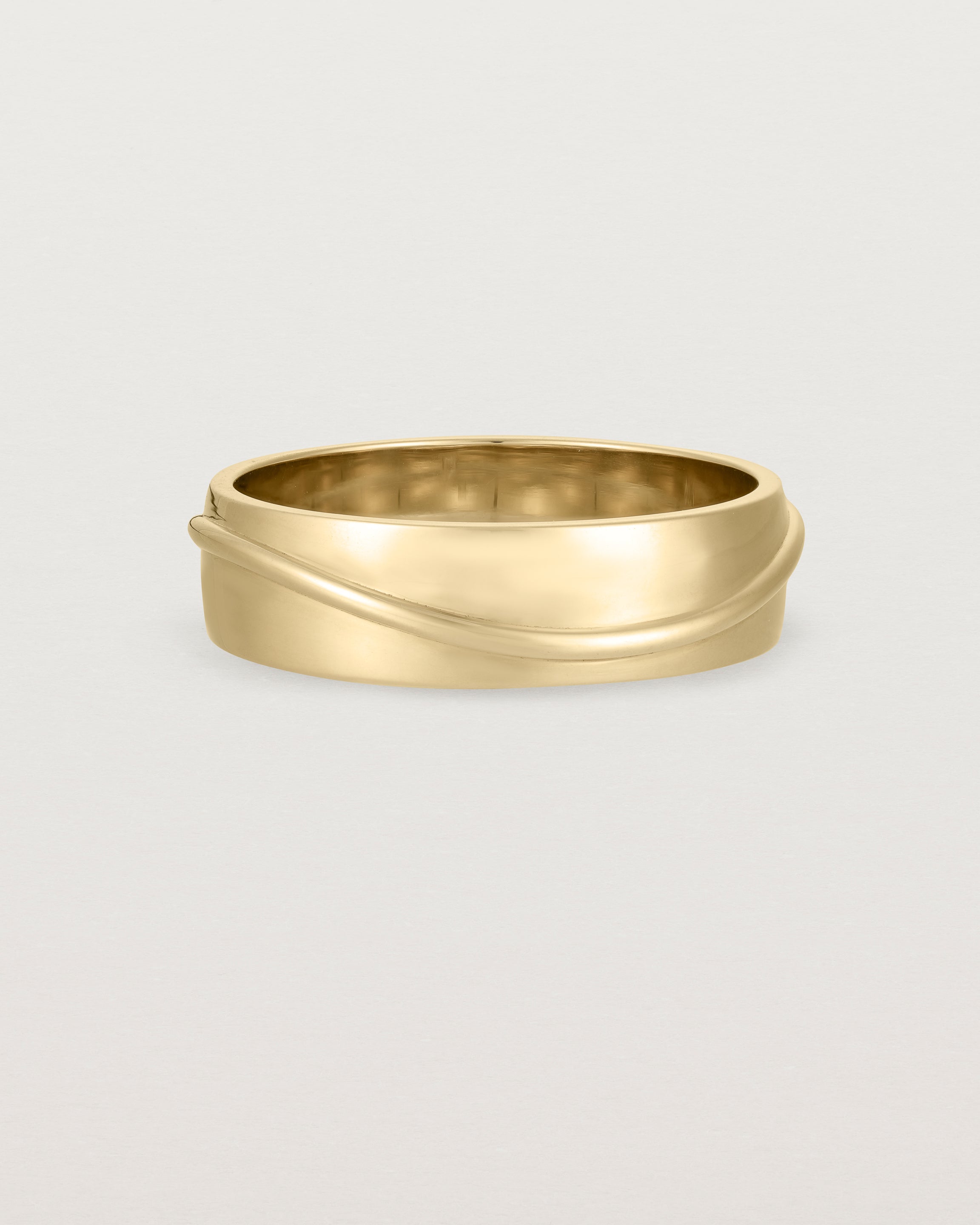 Front view of the Surge Wedding Ring | 6mm | Yellow Gold.