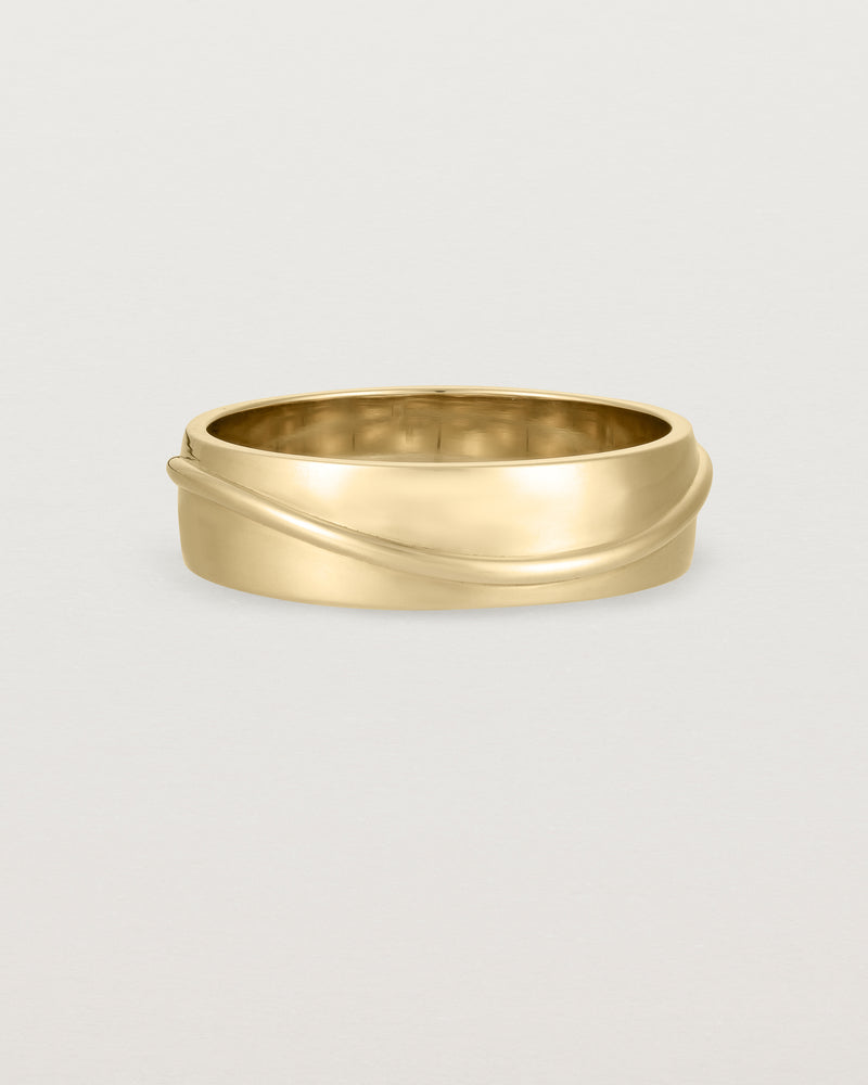 Front view of the Surge Wedding Ring | 6mm | Yellow Gold.