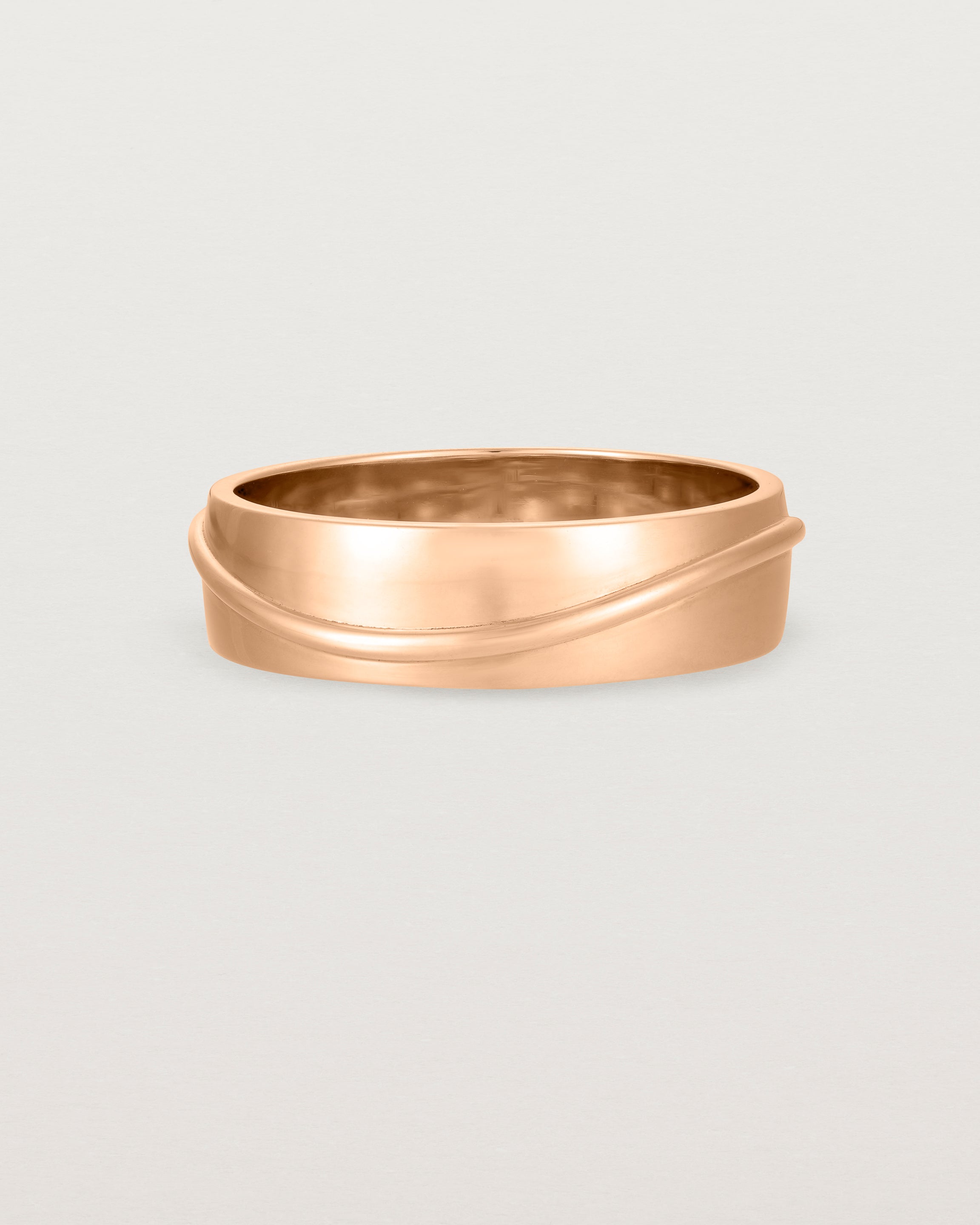 Side view of the Surge Wedding Ring | 6mm | Rose Gold.