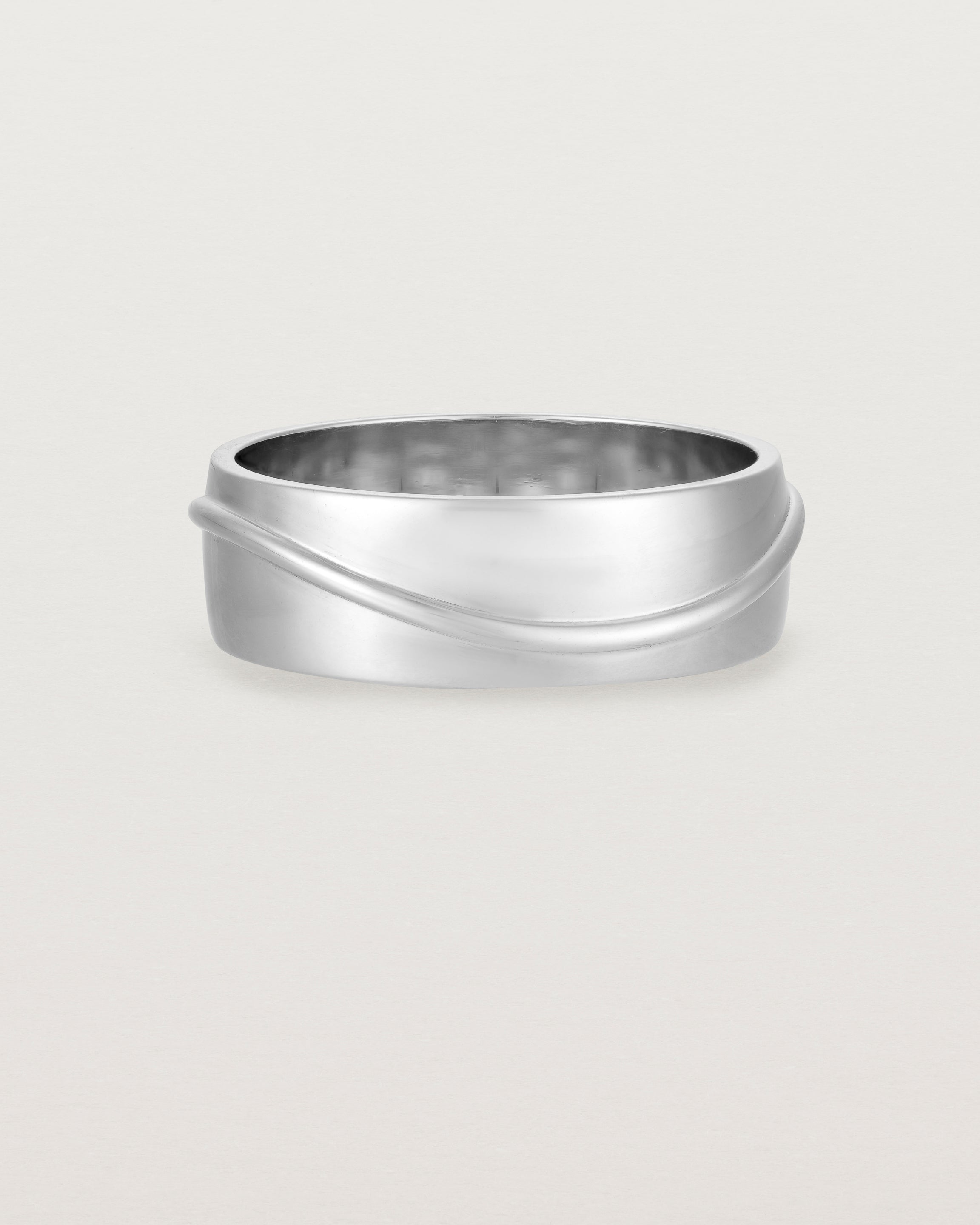 Front view of the Surge Wedding Ring | 7mm | White Gold.