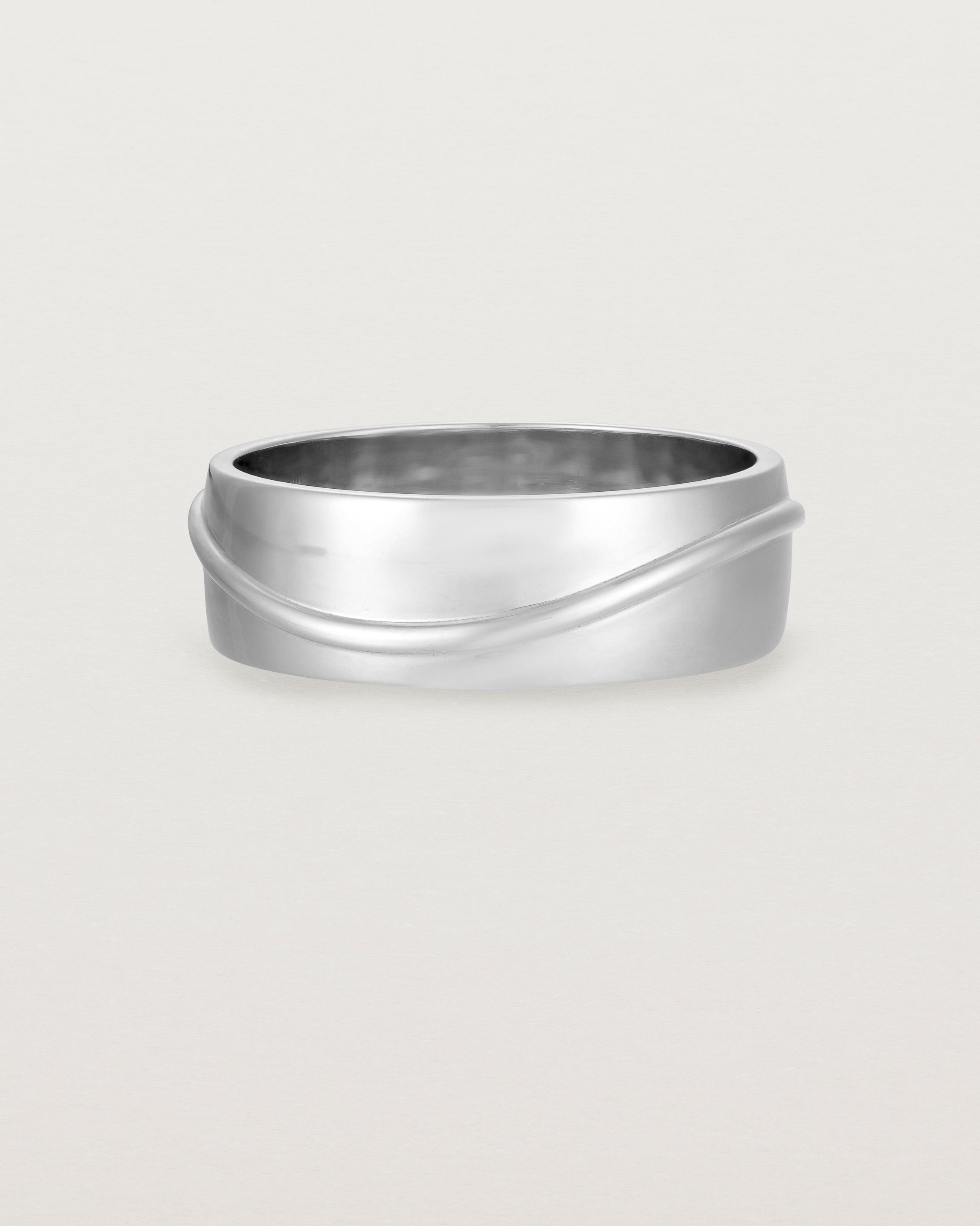 Side view of the Surge Wedding Ring | 7mm | White Gold.
