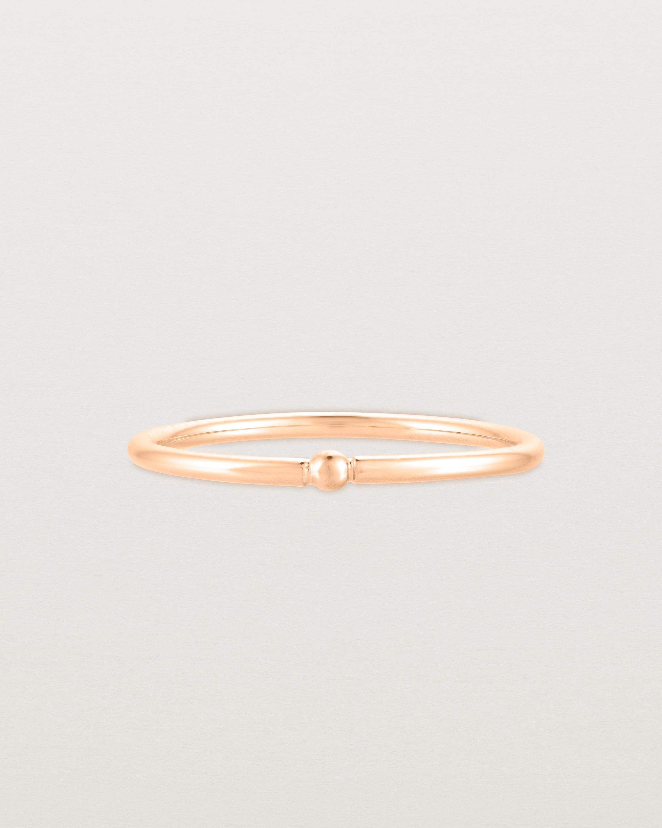 Front view of the Suspend Ring in Rose Gold.