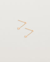 A pair of Tellue Drop Studs in Rose Gold.