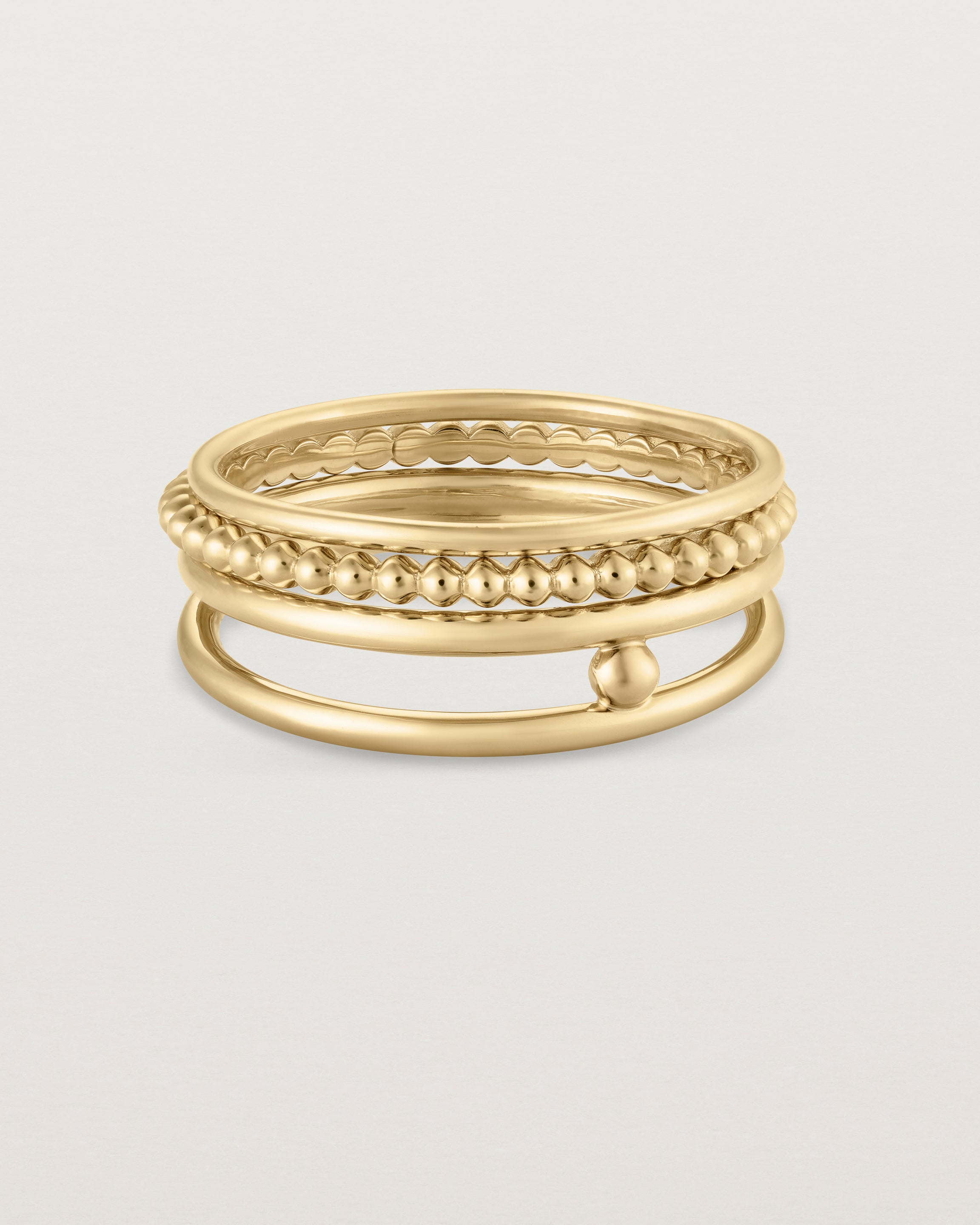 Front view of the Textured Curated Ring Set in yellow gold.