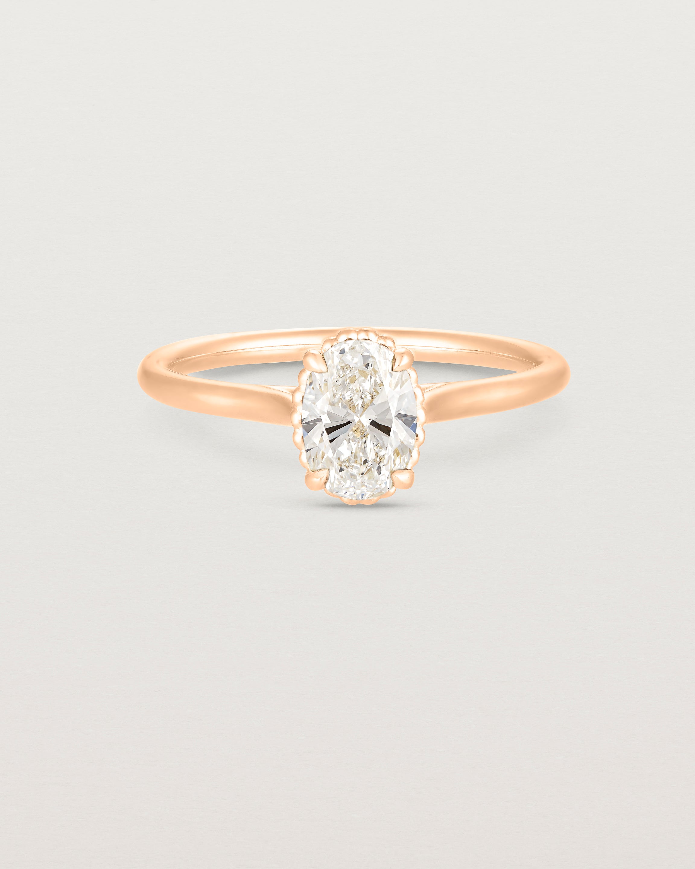 A front view of the Thea Oval Solitaire with a white Laboratory Grown Diamond in Rose Gold