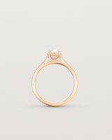 A side profile of the Thea Oval Solitaire with a white Laboratory Grown Diamond in Rose Gold