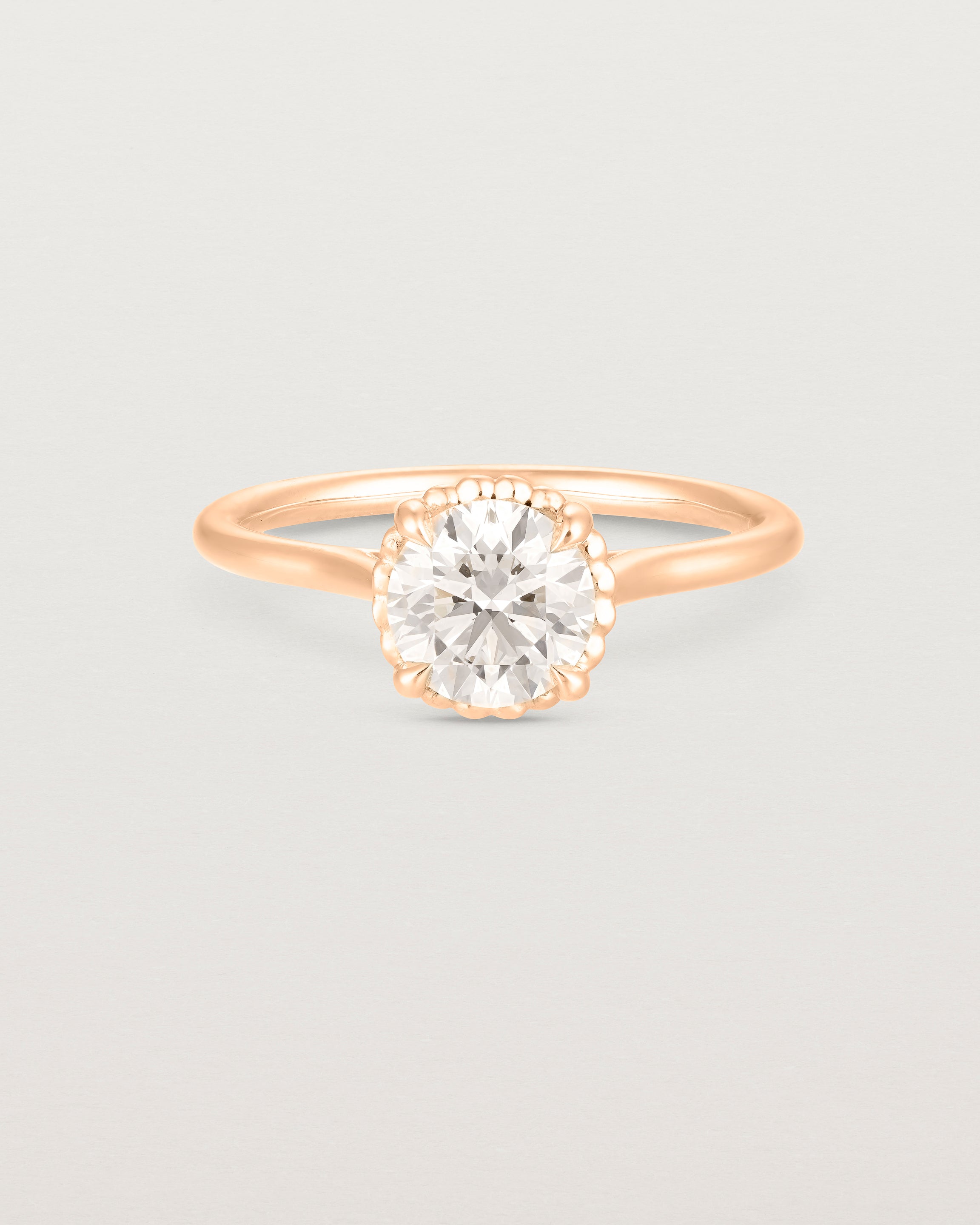 A front view of the Thea Round Solitaire with a white Laboratory Grown Diamond in Rose Gold