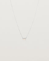 Front view of the Tiny Half Moon Pendant | Moonstone in sterling silver.