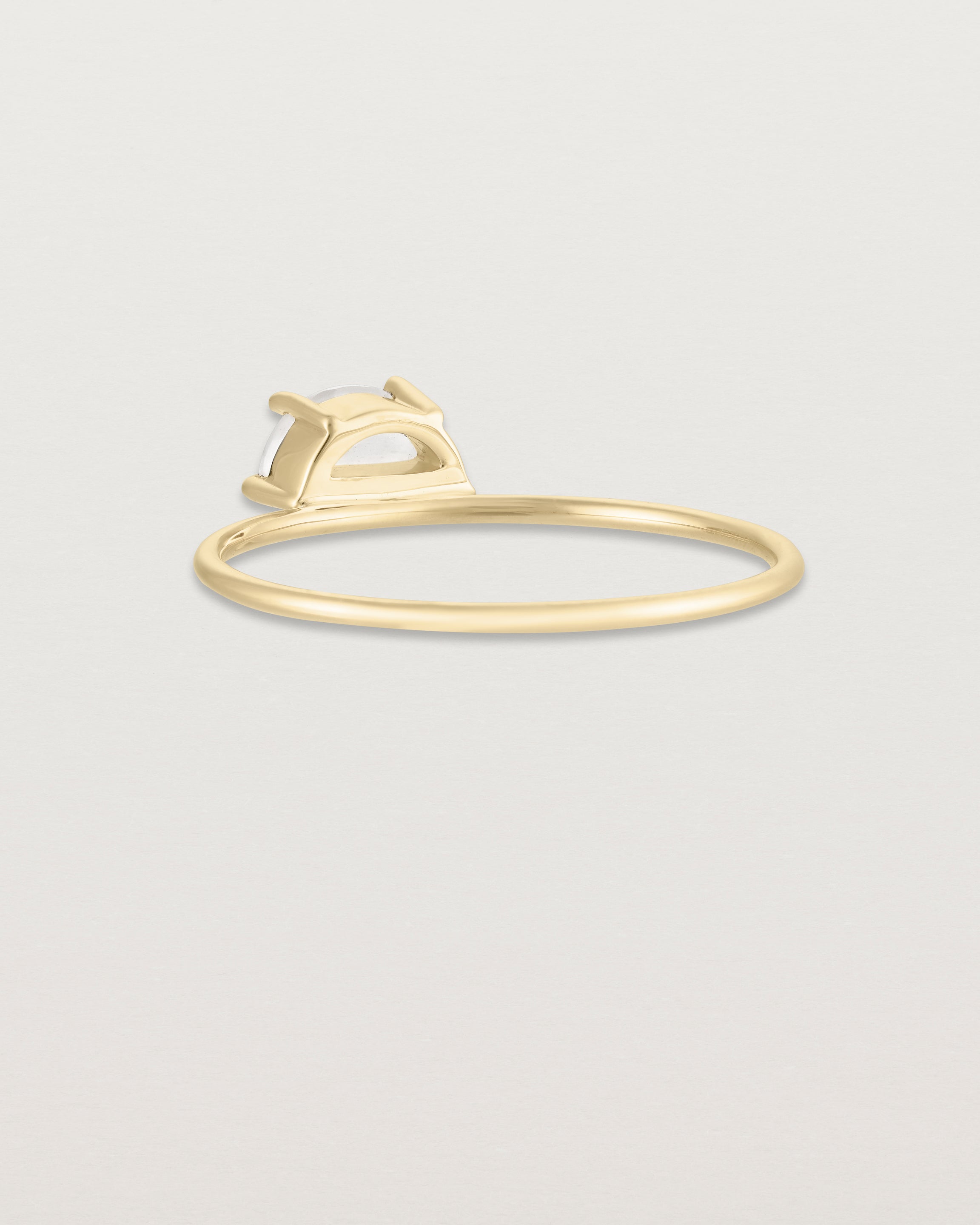 Back view of the Tiny Half Moon Ring | Moonstone in yellow gold.