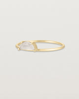 Angled view of the Tiny Half Moon Ring | Moonstone in yellow gold.