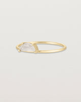 Angled view of the Tiny Half Moon Ring | Moonstone in yellow gold.