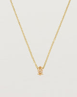 Close up of the Tiny Marquise Necklace with Rutilated Quartz in yellow gold.