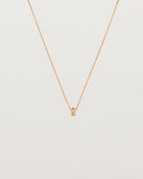 Close up of the Tiny Marquise Necklace with Rutilated Quartz in rose gold.