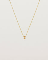 Front view of the Tiny Marquise Necklace with Rutilated Quartz in yellow gold.