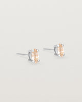 A pair of sterling silver studs featuring a marquise shaped light yellow rutilated quartz