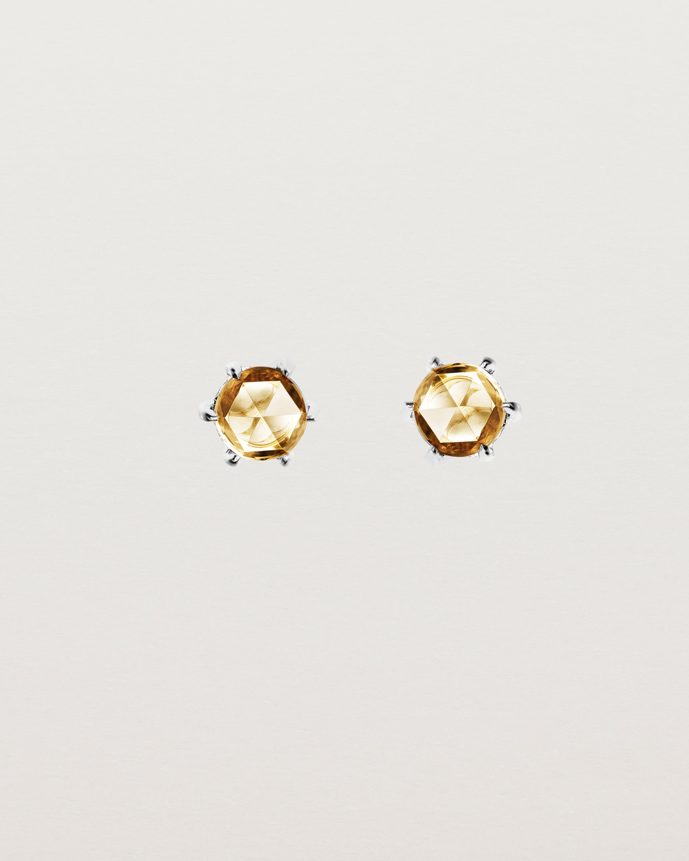 Front view of the Tiny Rose Cut Studs | Honey Quartz in white gold.