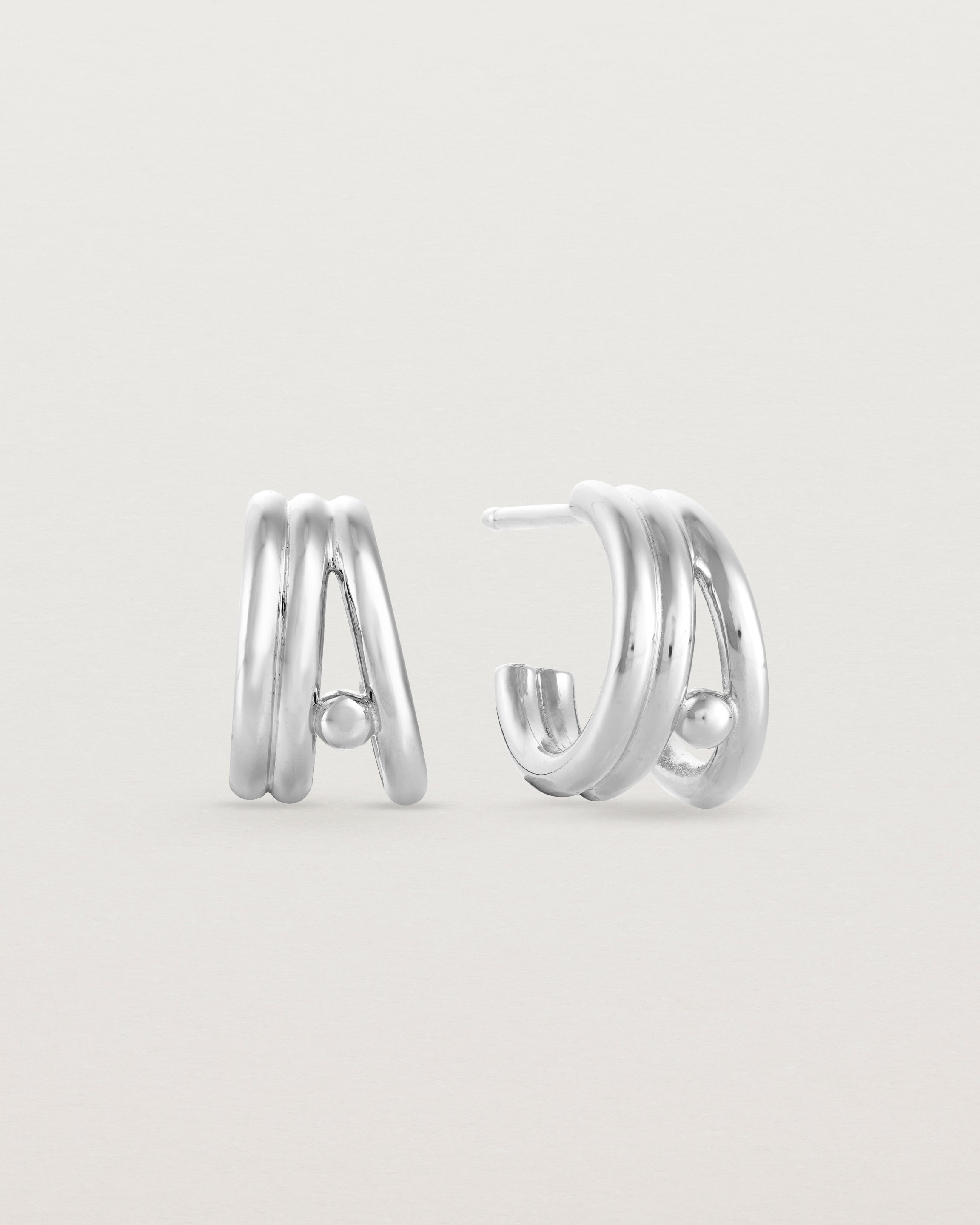 Front view of a pair of Triple Reliquum Hoops in sterling silver.