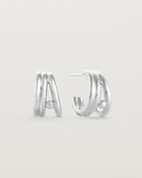 Front view of a pair of Triple Reliquum Hoops in sterling silver.
