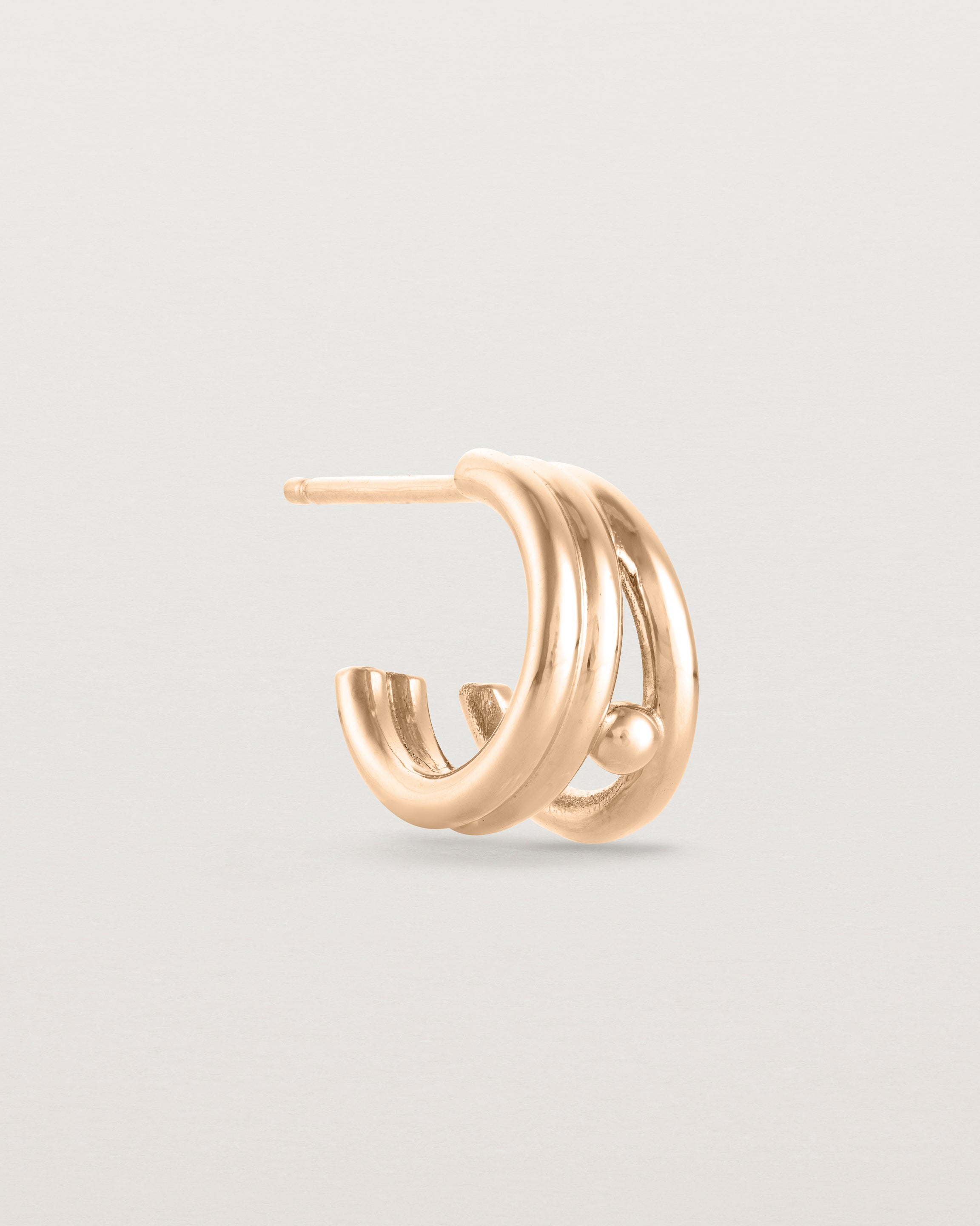 A single Triple Reliquum Hoop in rose gold.