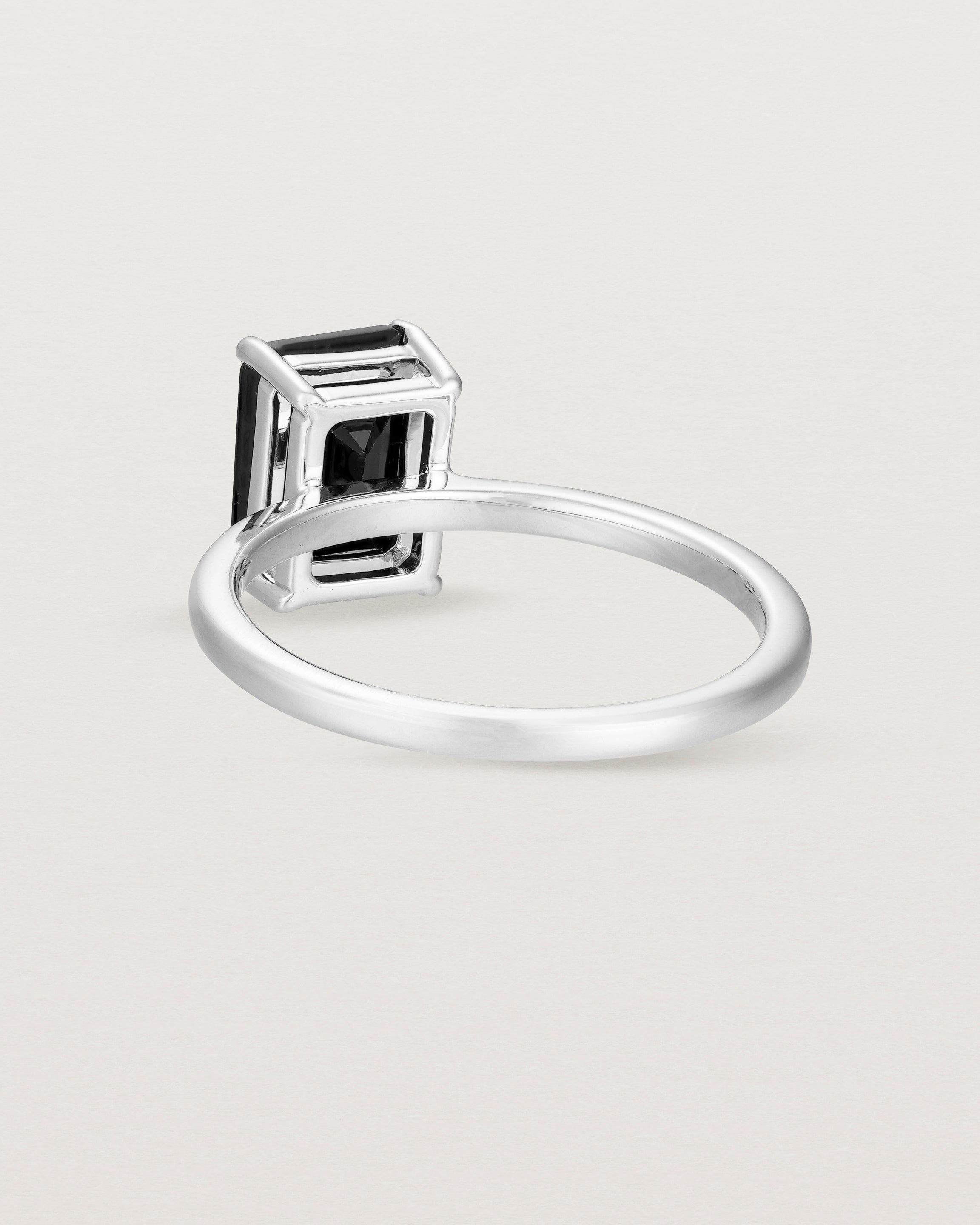 Back view of the Una Emerald Solitaire | Black Spinel | White Gold.