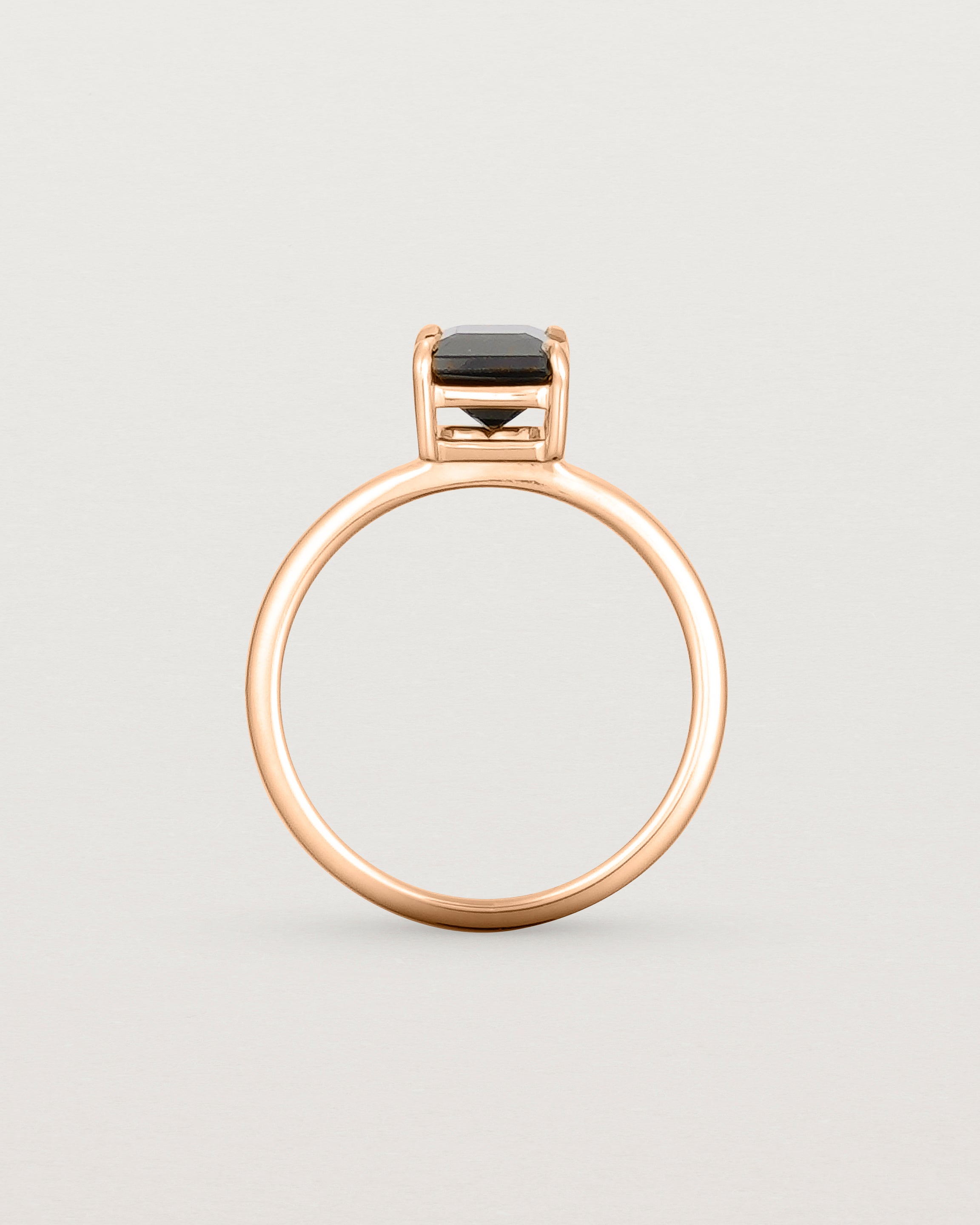 Standing view of the Una Emerald Solitaire | Black Spinel | Rose Gold.