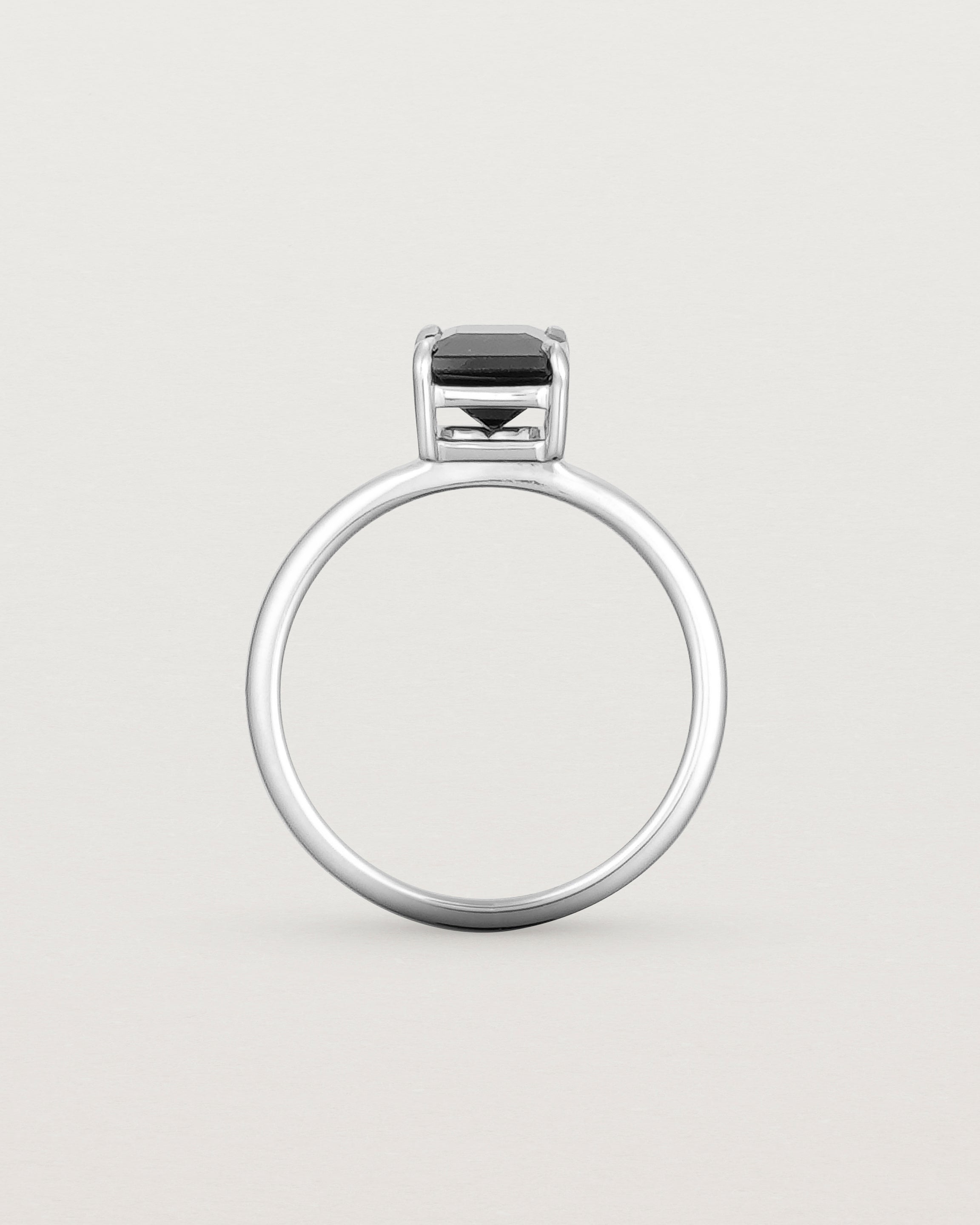 Standing view of the Una Emerald Solitaire | Black Spinel | White Gold.