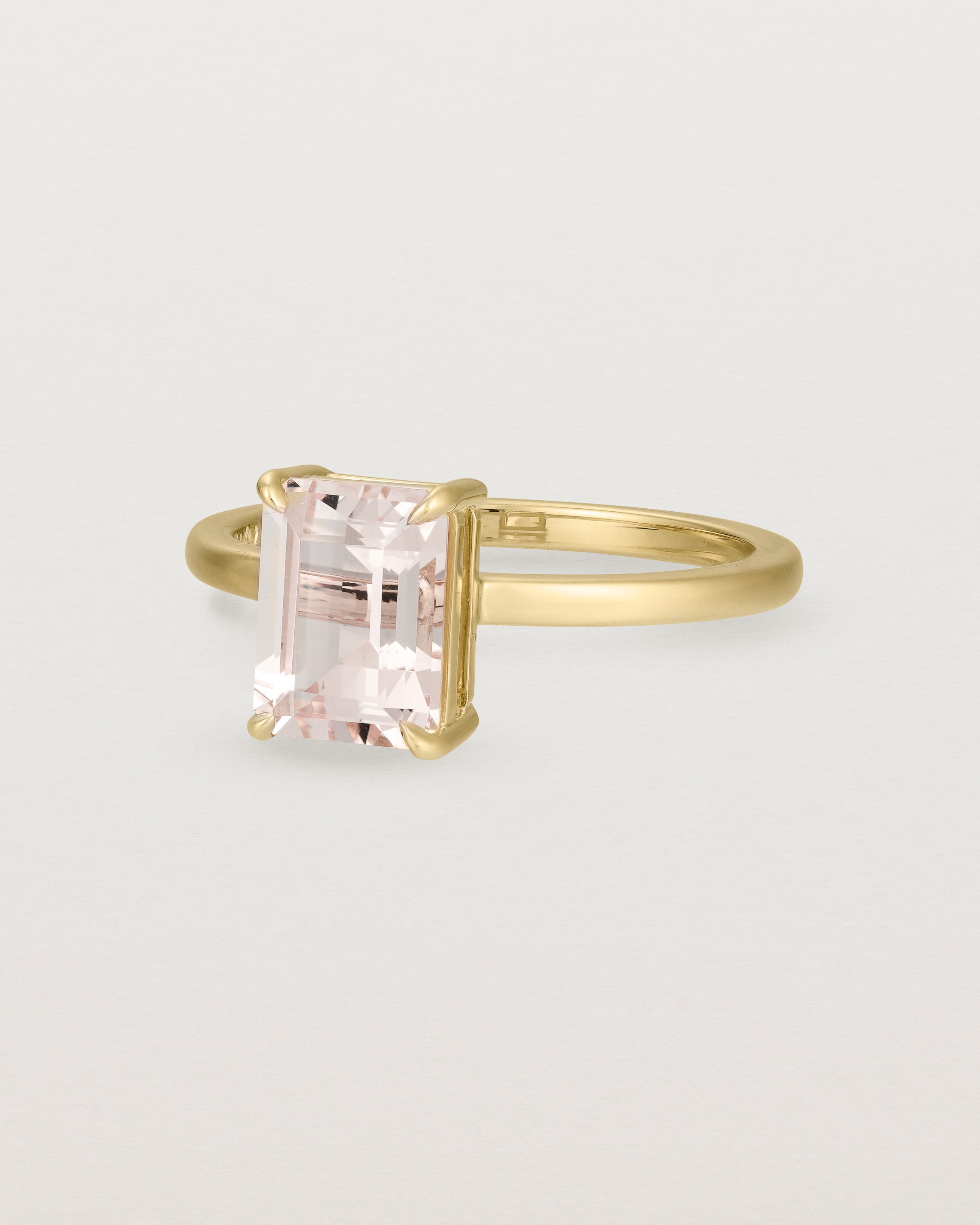 Side view of the Una Emerald Solitaire | Morganite | Yellow Gold.