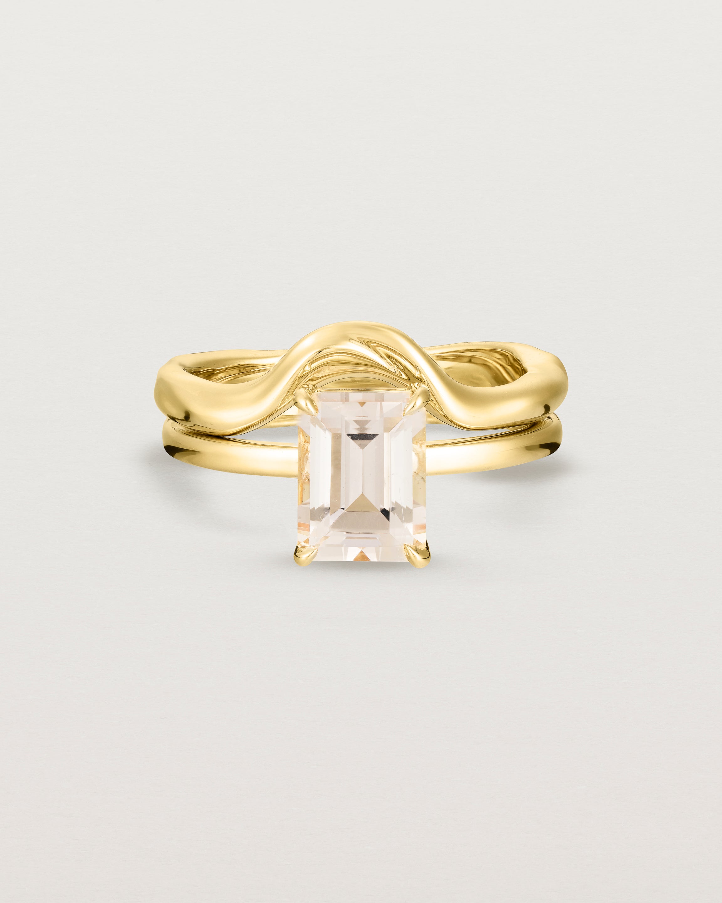 Front view of the Una Emerald Solitaire | Morganite | Yellow Gold stacked with the Organic Crown Ring. 