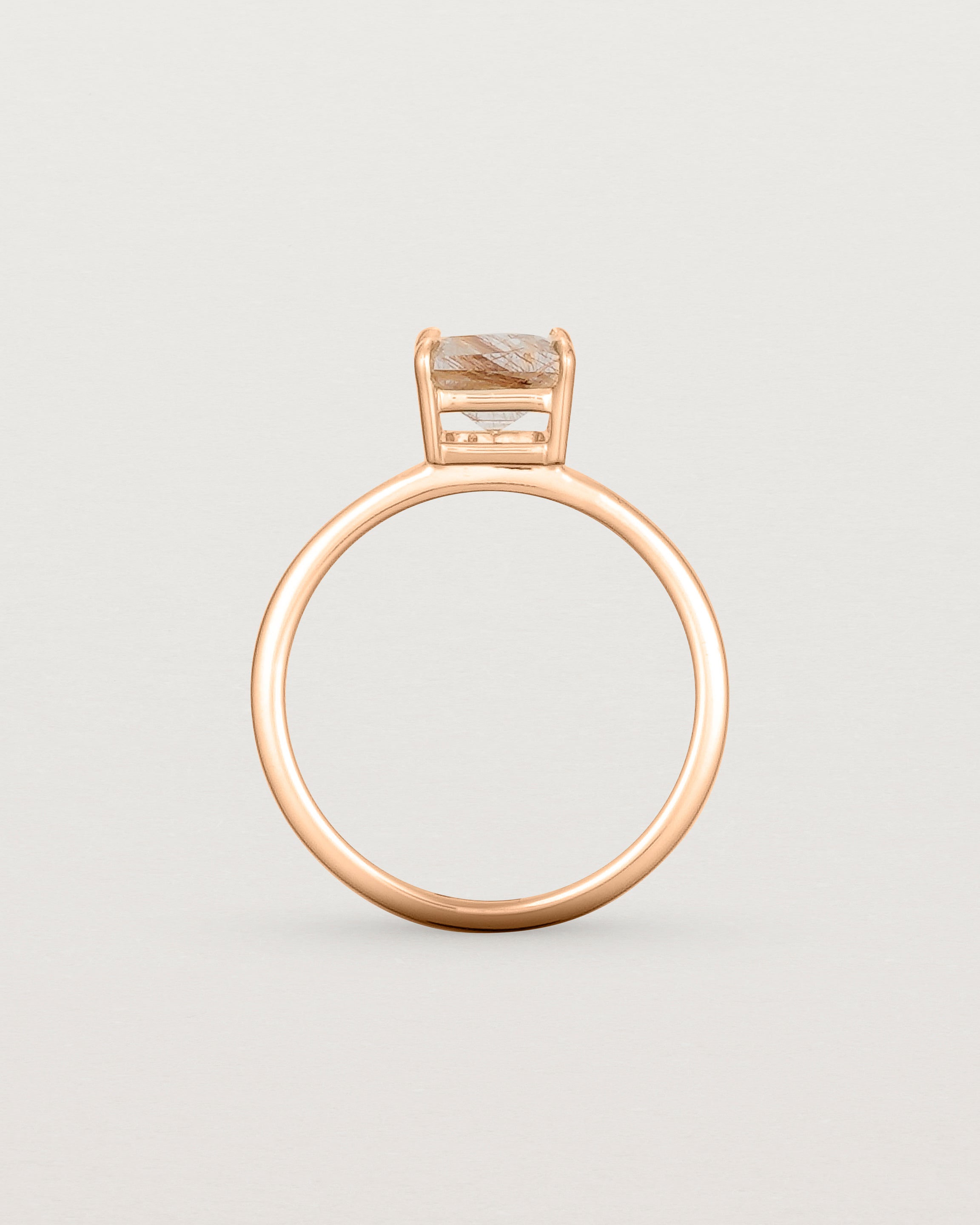 Standing view of the Una Emerald Solitaire | Rutilated Quartz | Rose Gold.