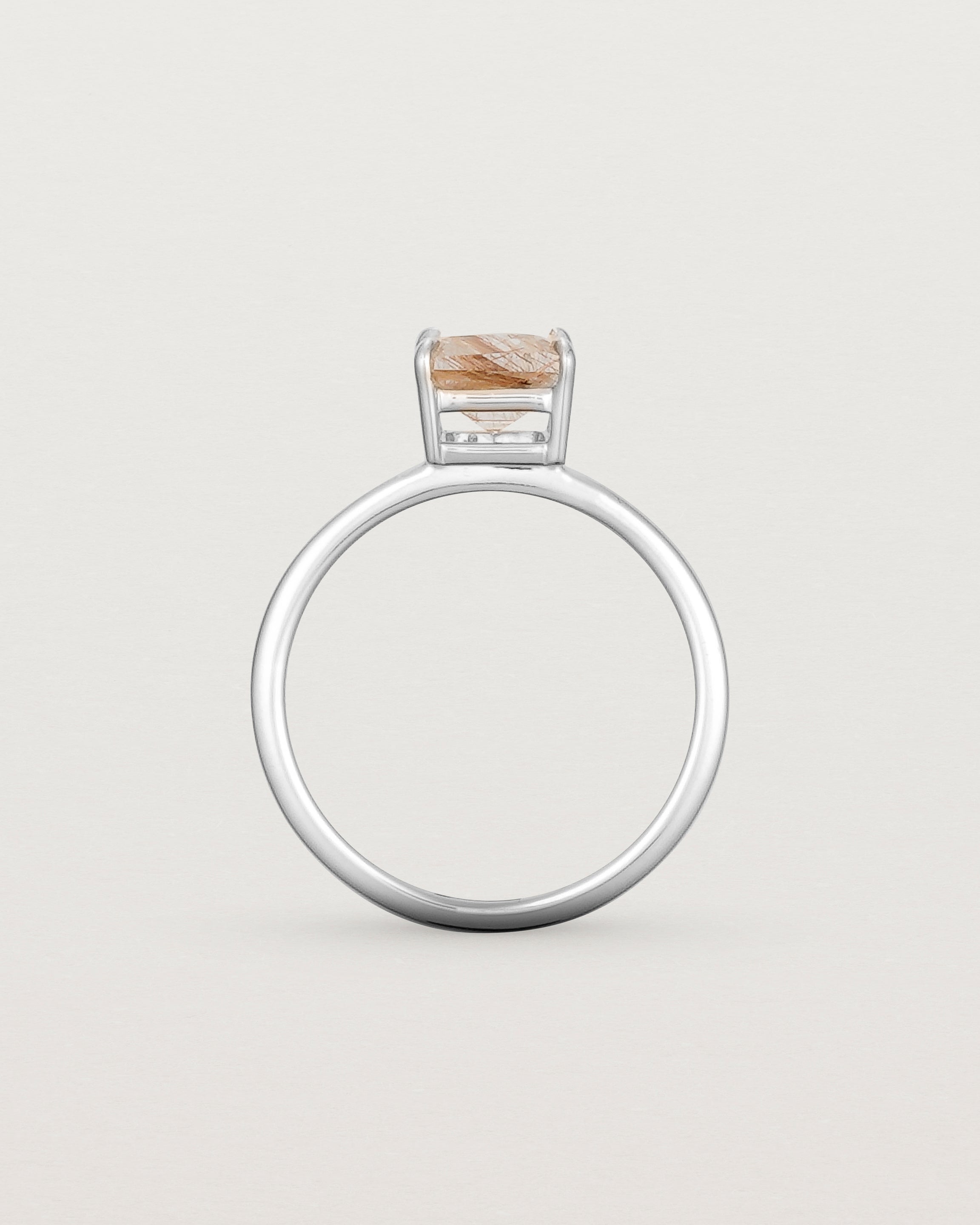 Standing view of the Una Emerald Solitaire | Rutilated Quartz | White Gold.
