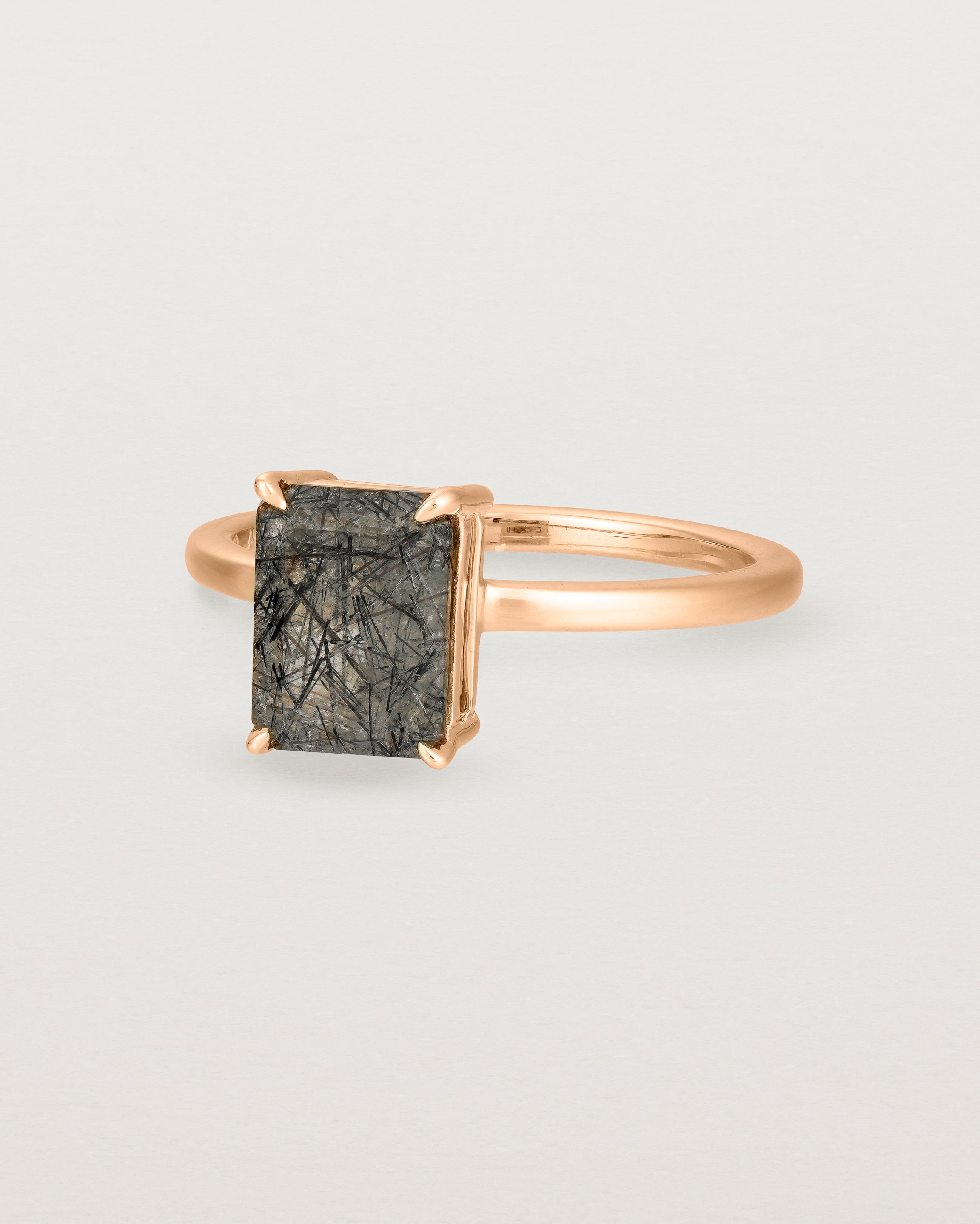 Angled view of the Una Emerald Solitaire | Tourmalinated Quartz | Rose Gold.