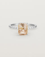 Front view of the Una Emerald solitaire with tourmalinated quartz featuring white diamond shoulders, in white gold.